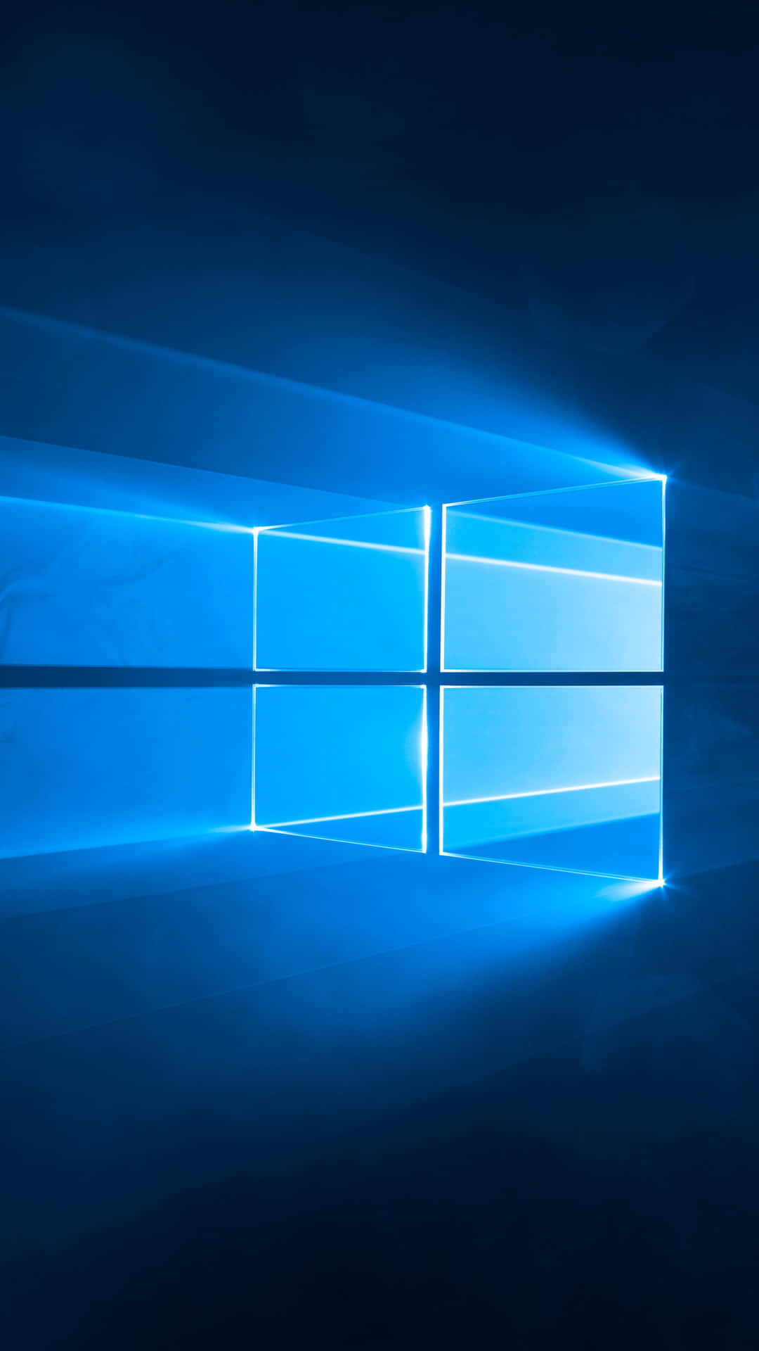 發光的藍色Windows標誌在黑暗房間中帶有光束 — Windows 10 GIF 壁紙