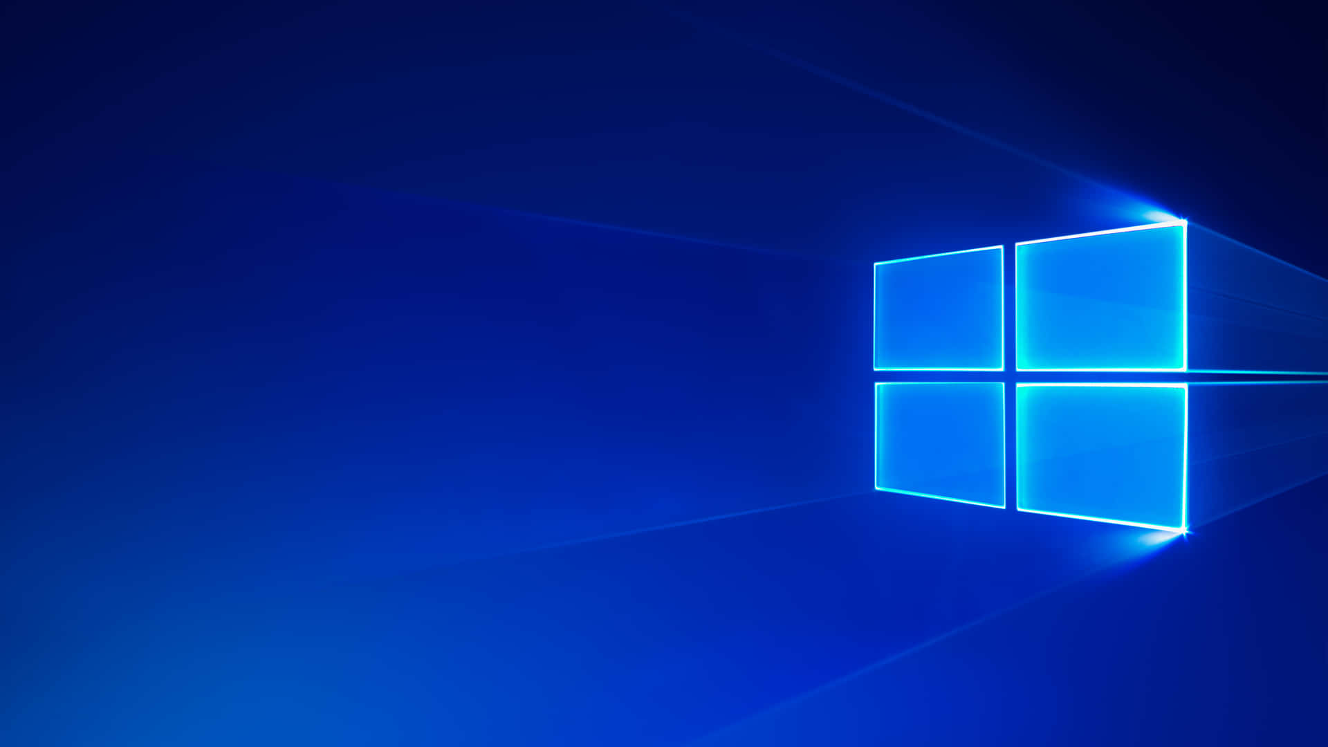 發光的藍色Windows標誌，在深藍色背景上帶有光線。 — Windows 10 GIF 壁紙