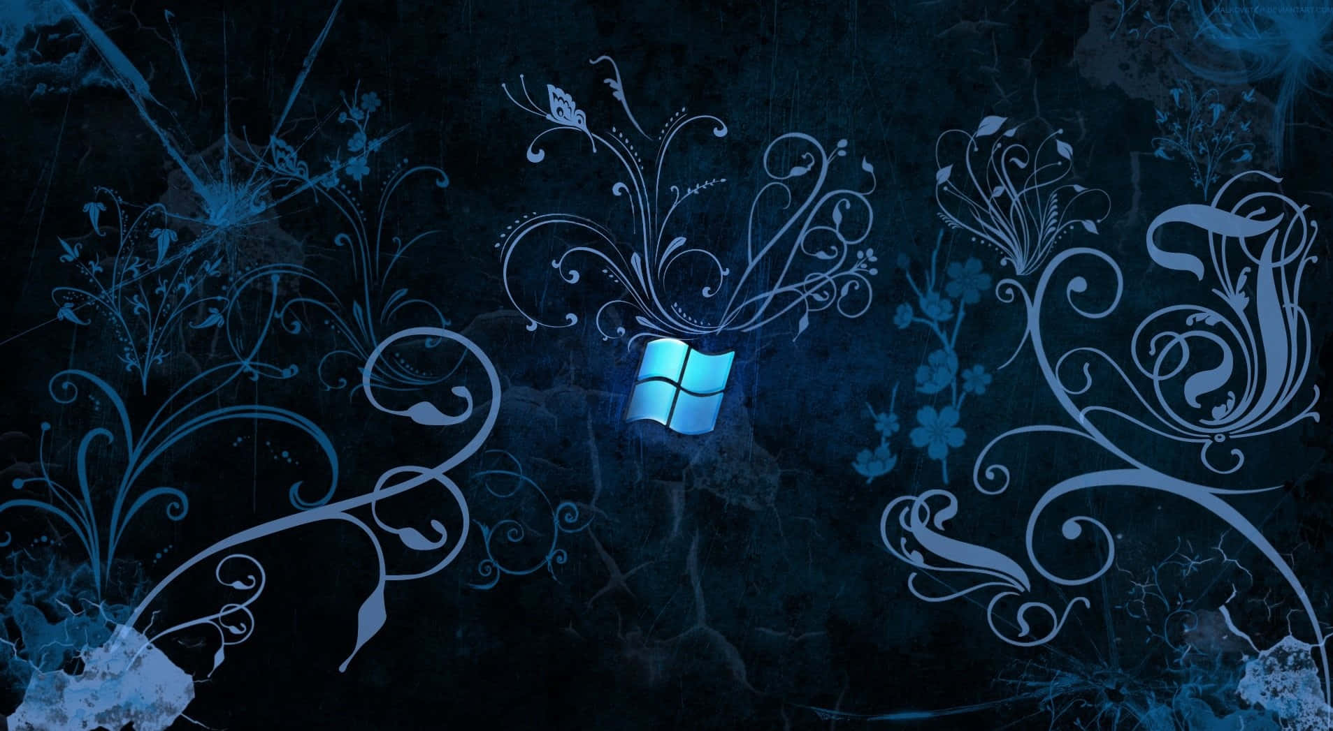 Windows 8 桌布 壁紙 — 一個發光的藍色Windows標誌，周圍環繞著複雜的白色花卉漩渦，背景為深色紋理。