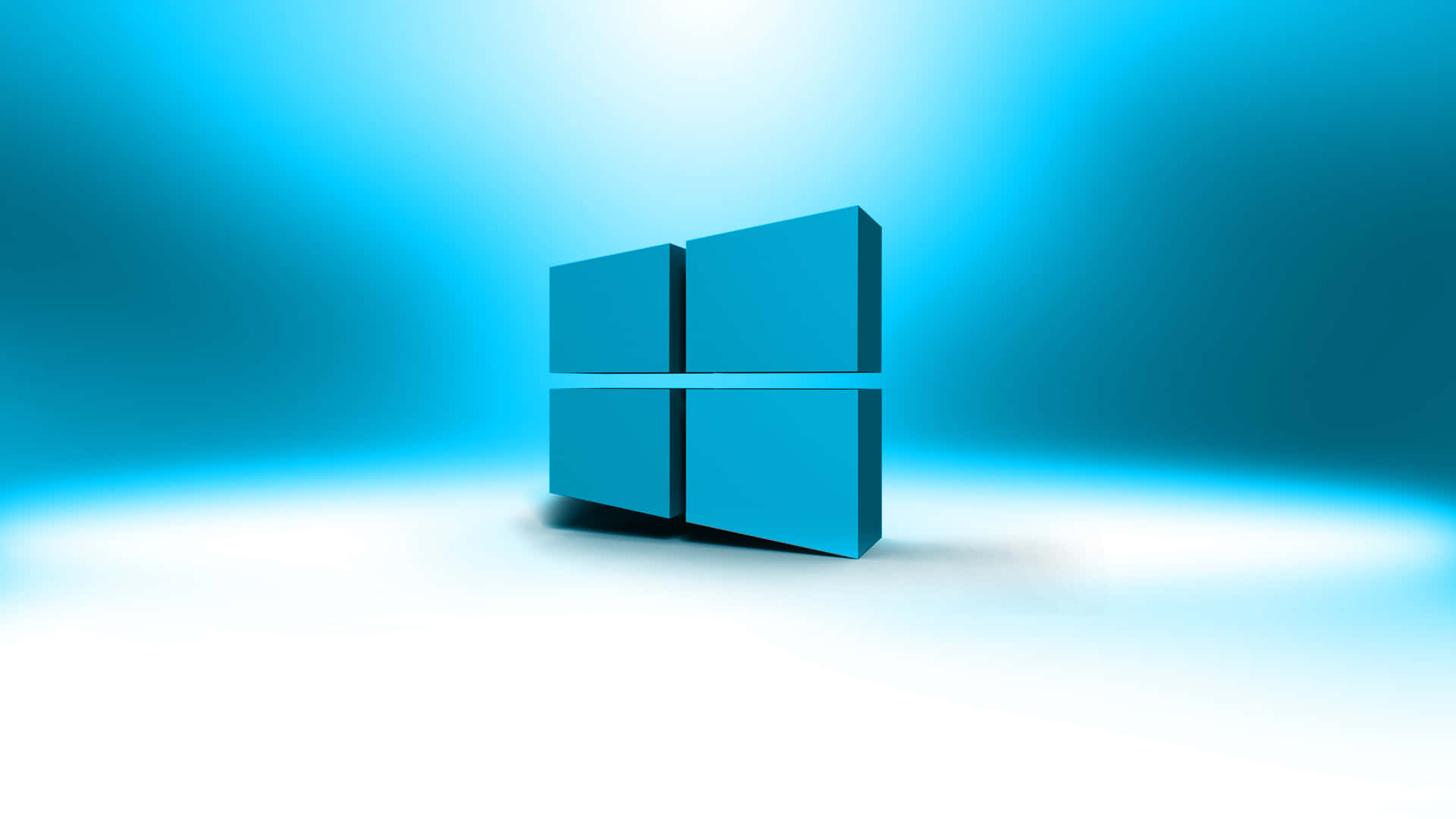 Cool Windows Desktop 桌布 壁紙 — 一個發光的藍色Windows標誌居中放置在帶有柔和照明的漸變藍白工作室地板上。