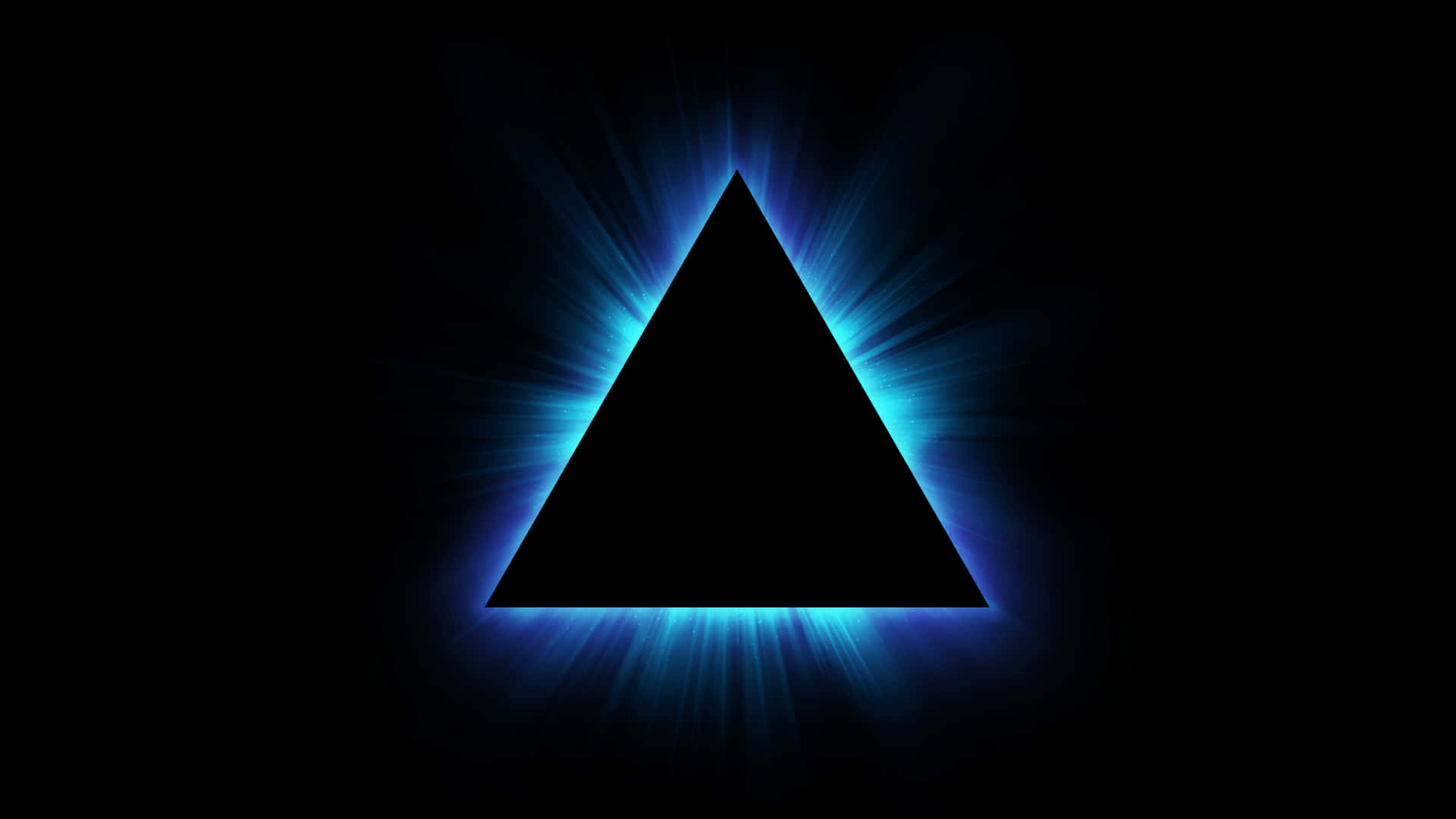illuminati 桌布 壁紙 — 一個發光的藍色三角形在漆黑的背景上散發光芒，形成引人注目的幾何對比。