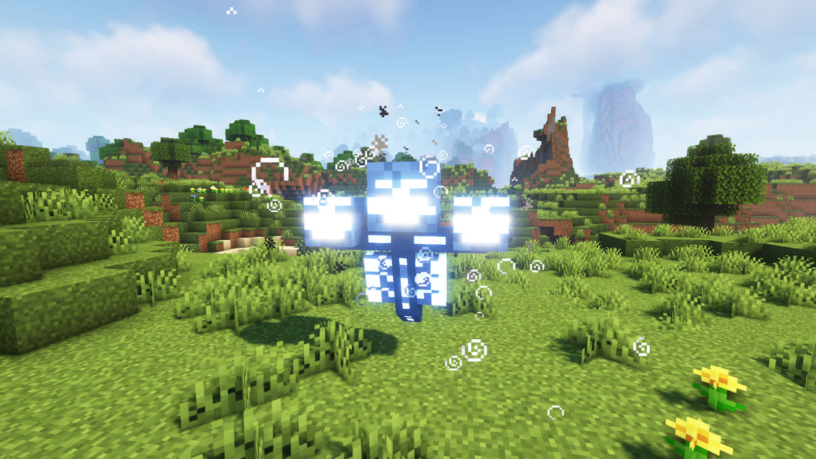 Minecraft Wither Boss 桌布 壁紙 — 一個發光的藍色像素生物在明亮的天空下漂浮在充滿活力的Minecraft草地上。