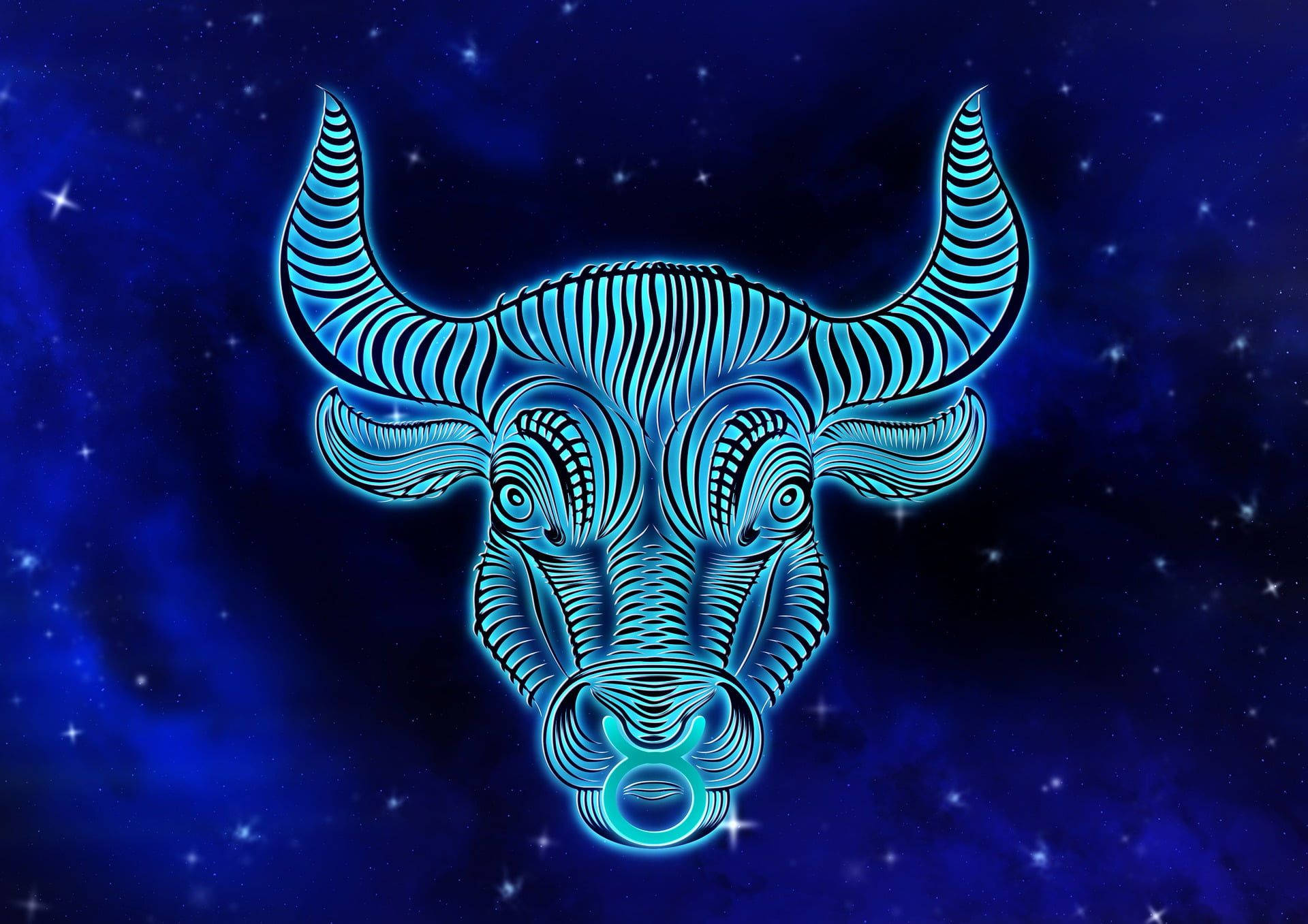 星座運勢 桌布 壁紙 — 一個發光的藍色公牛頭，帶有條紋圖案和星座符號，以星空宇宙夜空為背景。