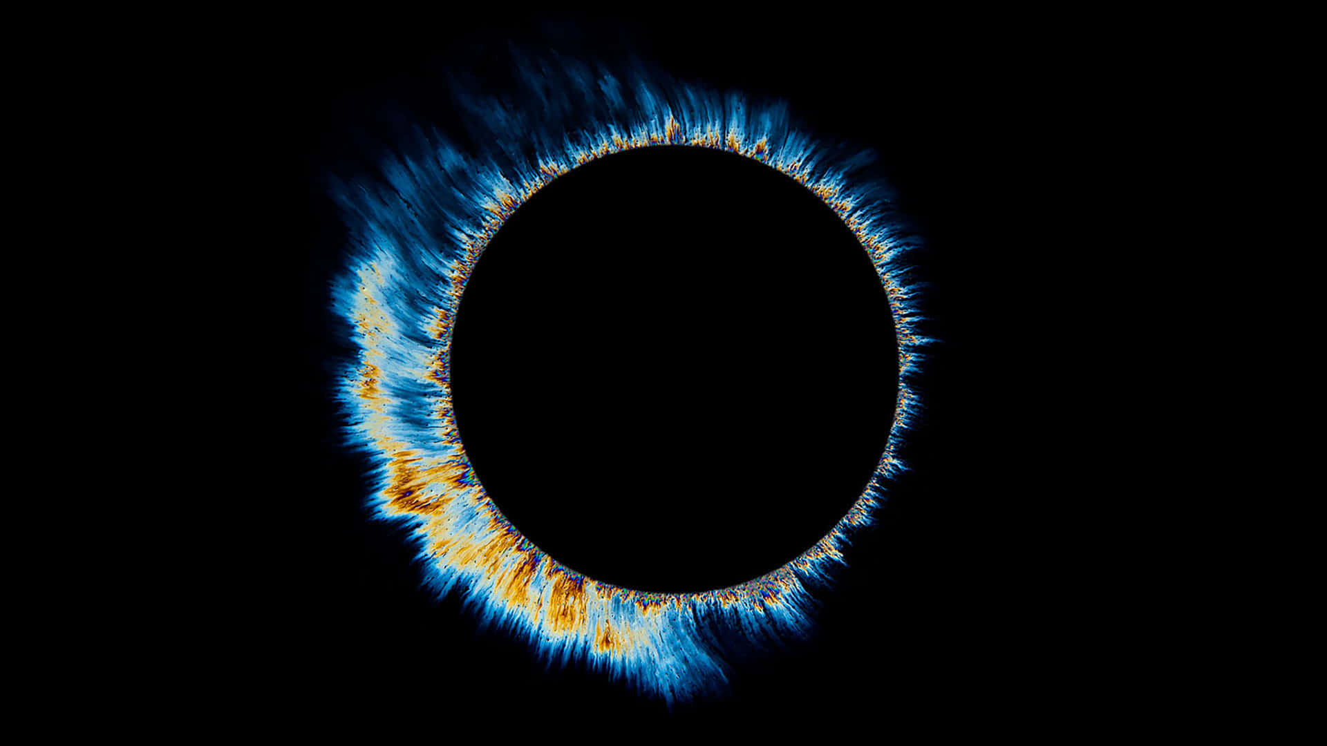 1080p Amoled 桌布 壁紙 — 一個發光的藍色和橙色等離子體狀能量環在漆黑的虛空中脈動。