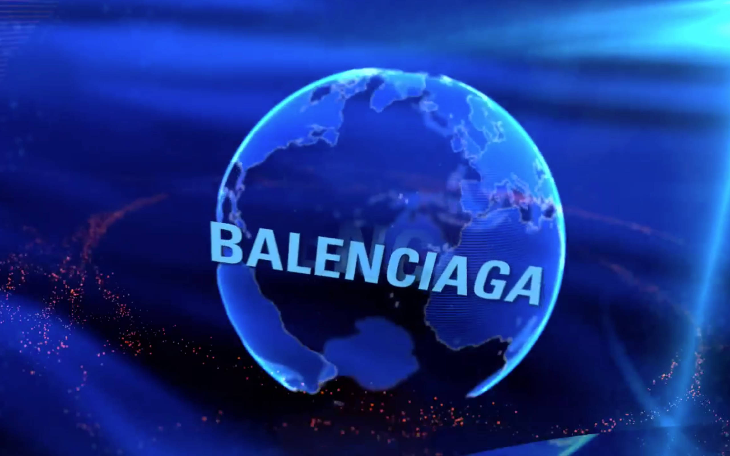 Balenciaga 桌布 壁紙 — 一個發光的藍色地球儀，上面有 Balenciaga 字樣漂浮在中心，背景是動態的數位藍色背景，帶有紅色粒子軌跡。