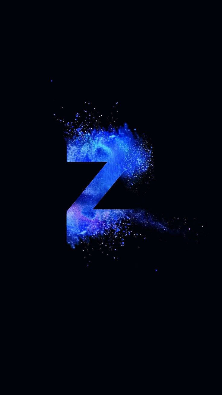 Z 桌布 壁紙 — 一個發光的藍色宇宙字母Z，在黑色虛空中迸發出星塵。
