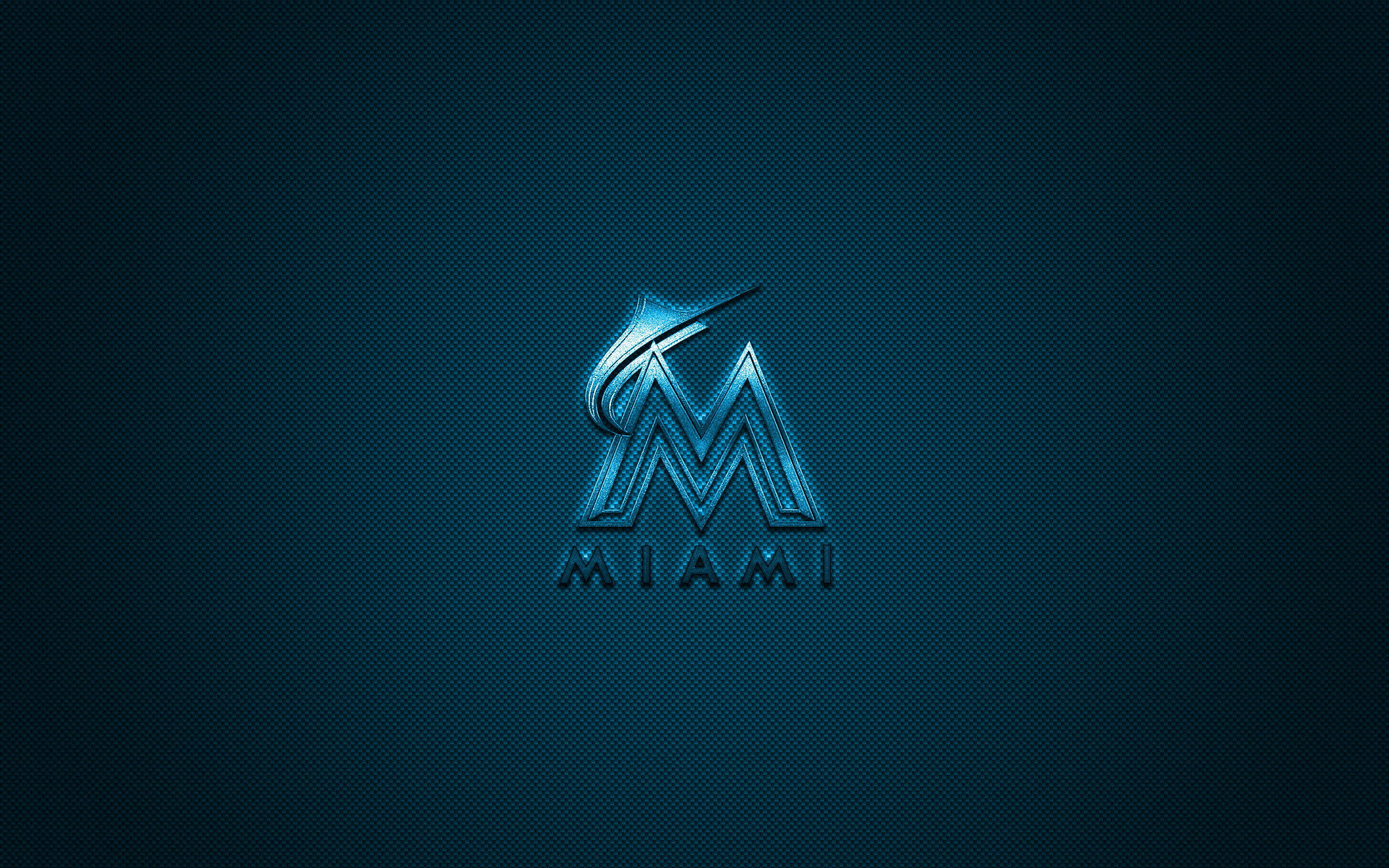 Marlins 桌布 壁紙 — 一個發光的藍色邁阿密馬林魚標誌，居中放置在帶有微妙漸變照明的深色紋理背景上。