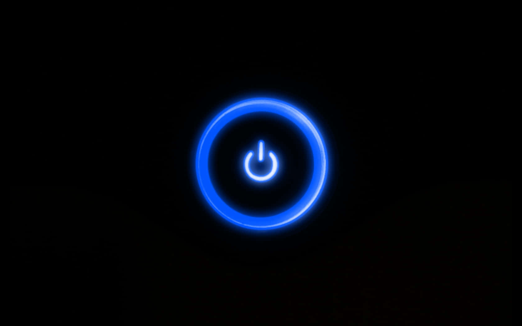 Blue Neon 桌布 壁紙 — 一個發光的藍色電源按鈕圖示在漆黑的背景上柔和地脈動。