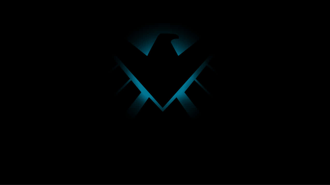 1366x768 Amoled 桌布 壁紙 — 一個發光的藍色風格化鷹徽從黑暗中浮現，帶有銳利的幾何線條和耀眼的光效。