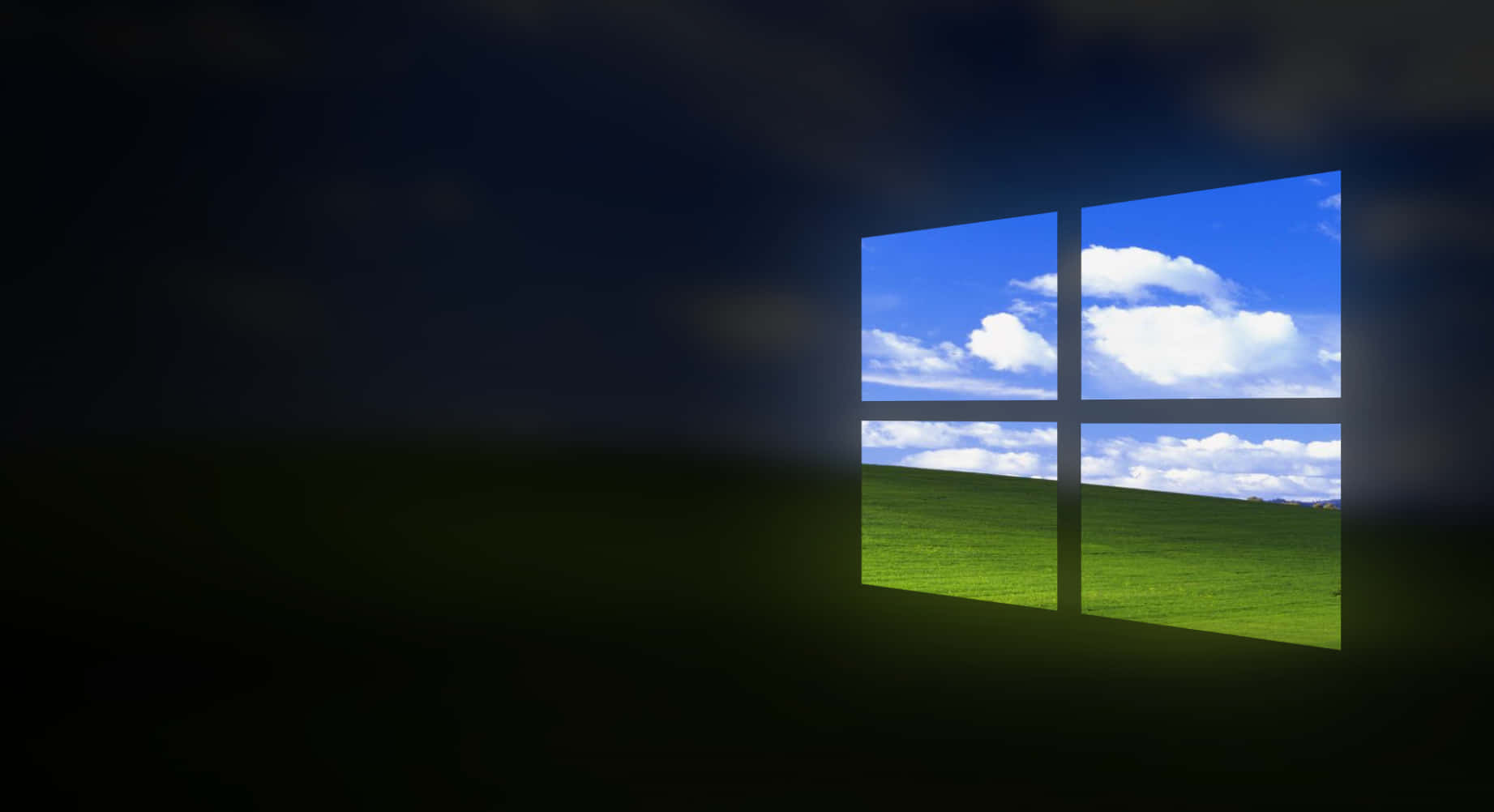 Windows 10 Desktop 桌布 壁紙 — 一個發光的視窗圖示框住明亮的藍天、蓬鬆的雲朵和充滿活力的綠草，背景為深色。
