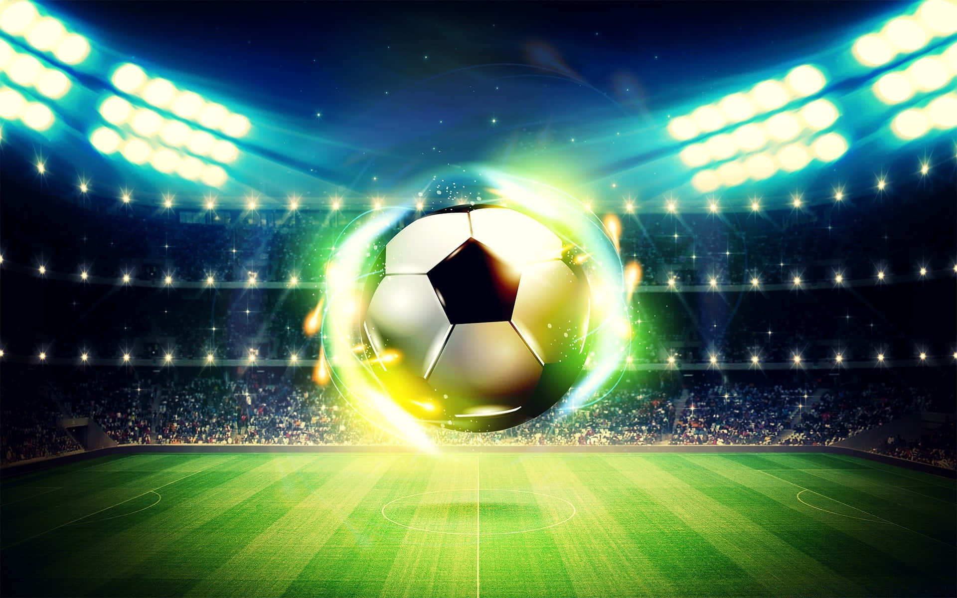 Football Field 桌布 壁紙 — 一個發光的足球在耀眼的球場燈光下，懸浮在充滿活力的綠色球場上空，四周是歡呼的人群。