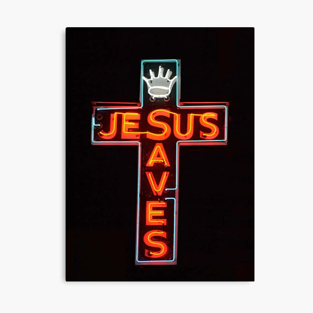 Jesus Saves 桌布 壁紙 — 一個發光的霓虹十字架，上面用粗體紅色字母寫著「JESUS SAVES」，頂部有一個白色的手印，背景為黑色。