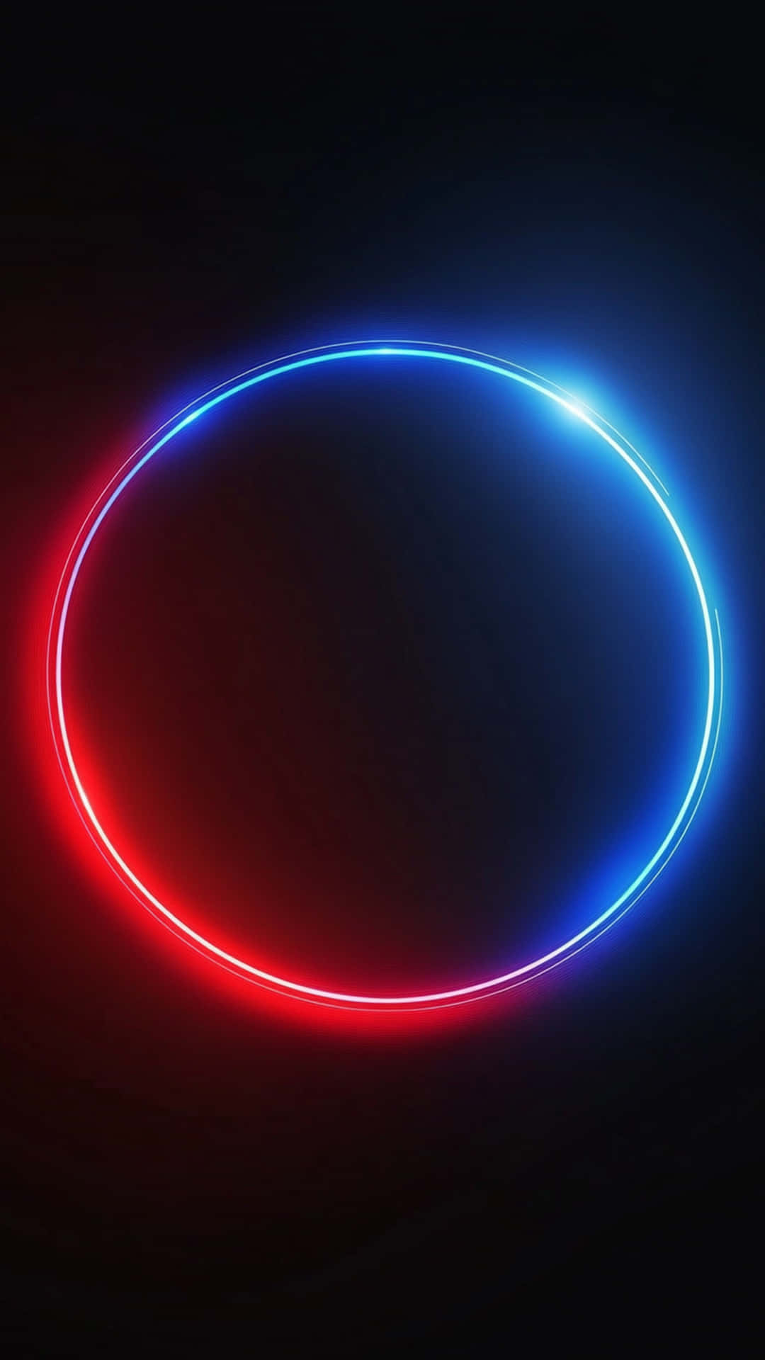 Neon galaxy with black background 壁紙 — 一個發光的霓虹圓圈，左側紅色，右側藍色，在黑暗背景上放射光芒。