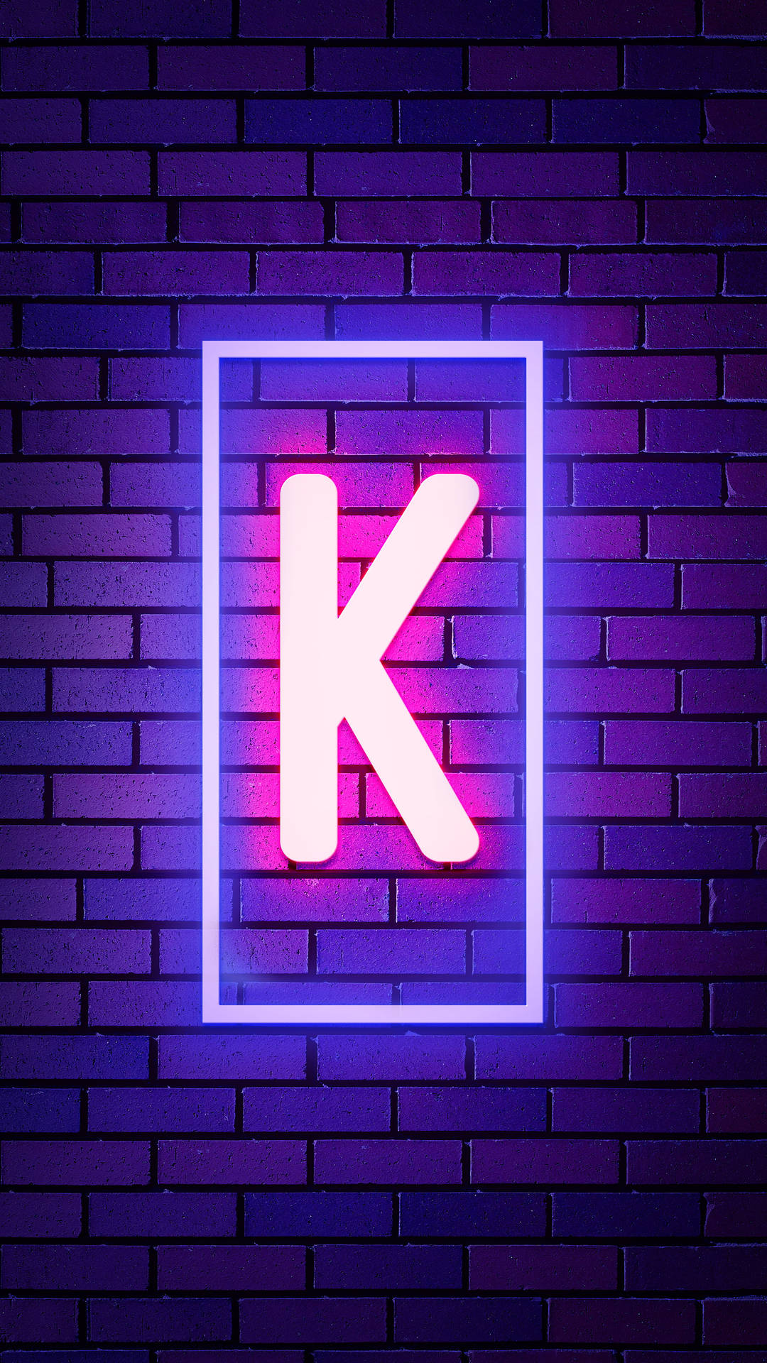 霓虹字母K在紫色磚牆上發光。 — 字母K動圖 壁紙