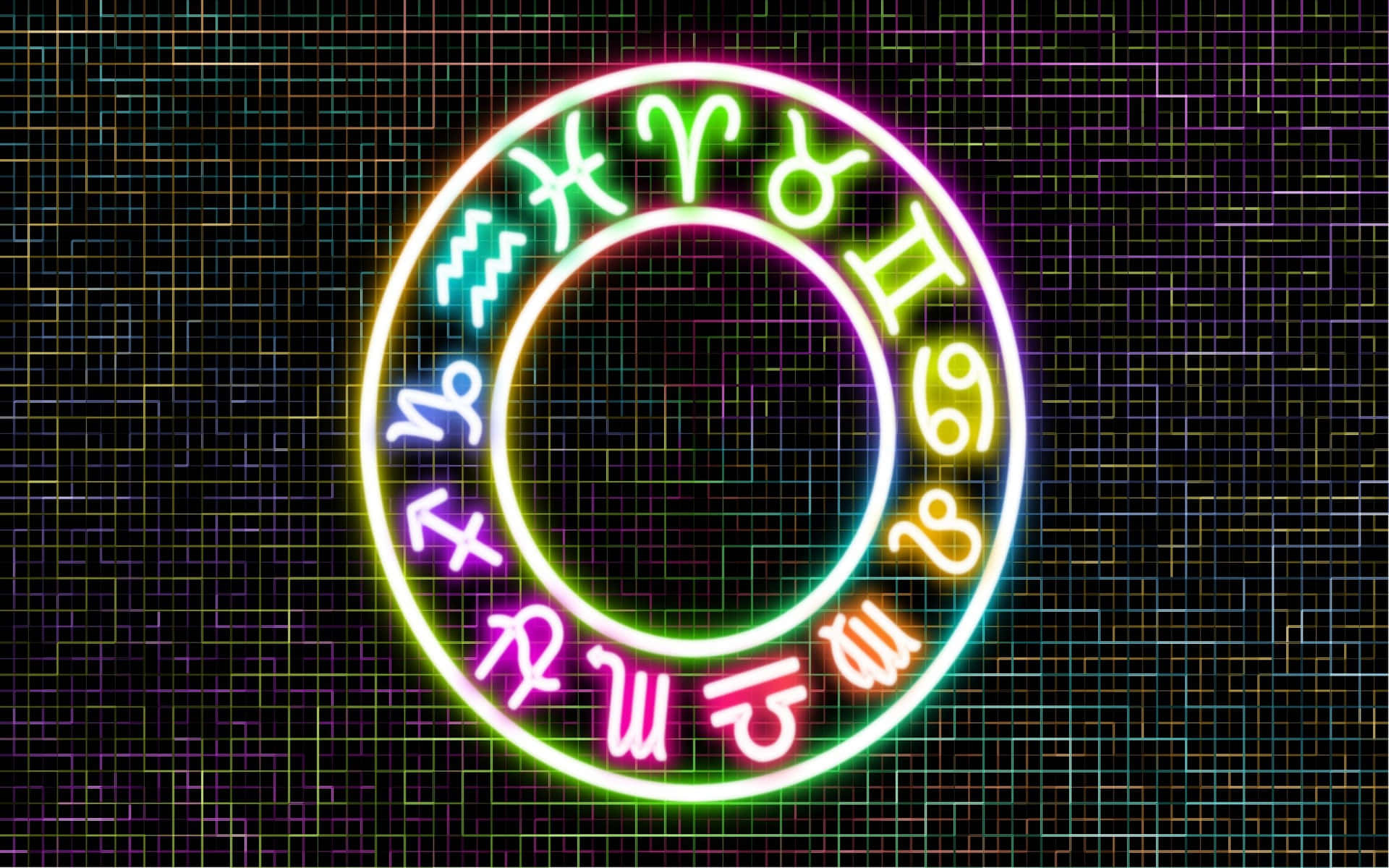 星座 桌布 壁紙 — 一個發光的霓虹星座輪，帶有鮮豔的彩虹符號，在黑暗的電路板背景下閃耀。