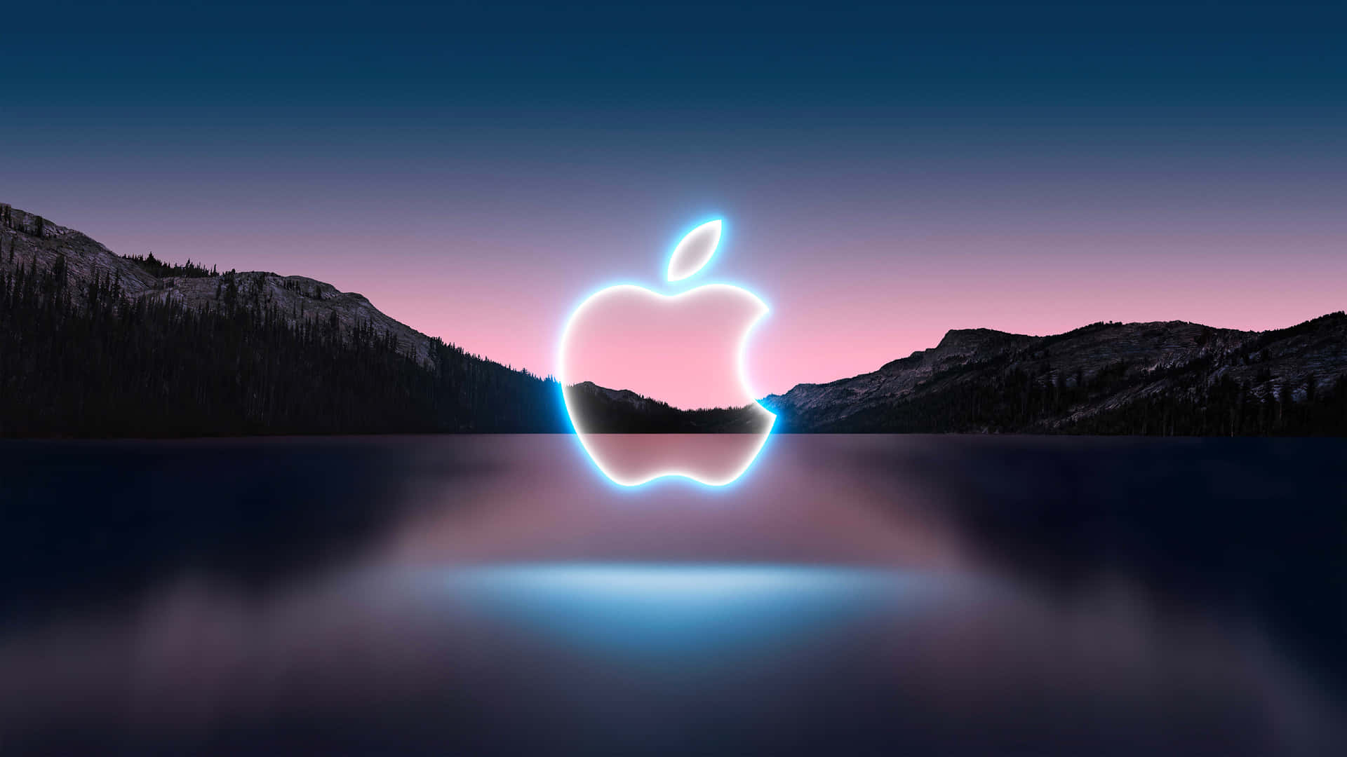 發光Apple標誌在黃昏時分倒映在水上山脈 — 山脈 壁紙