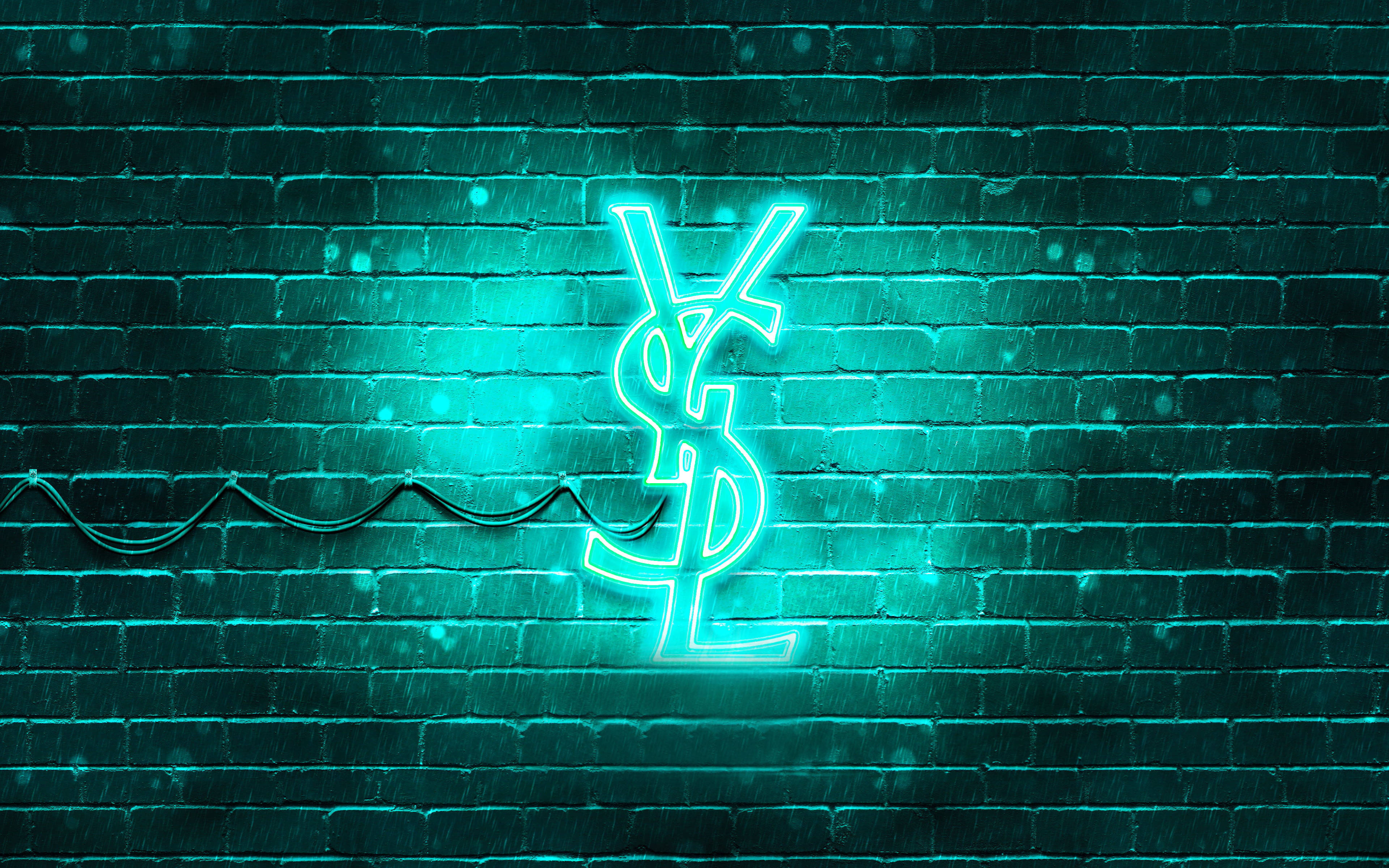 YSL 桌布 壁紙 — 一個發光的青綠色YSL霓虹燈牌在雨夜條件下照亮了濕漉漉的磚牆。