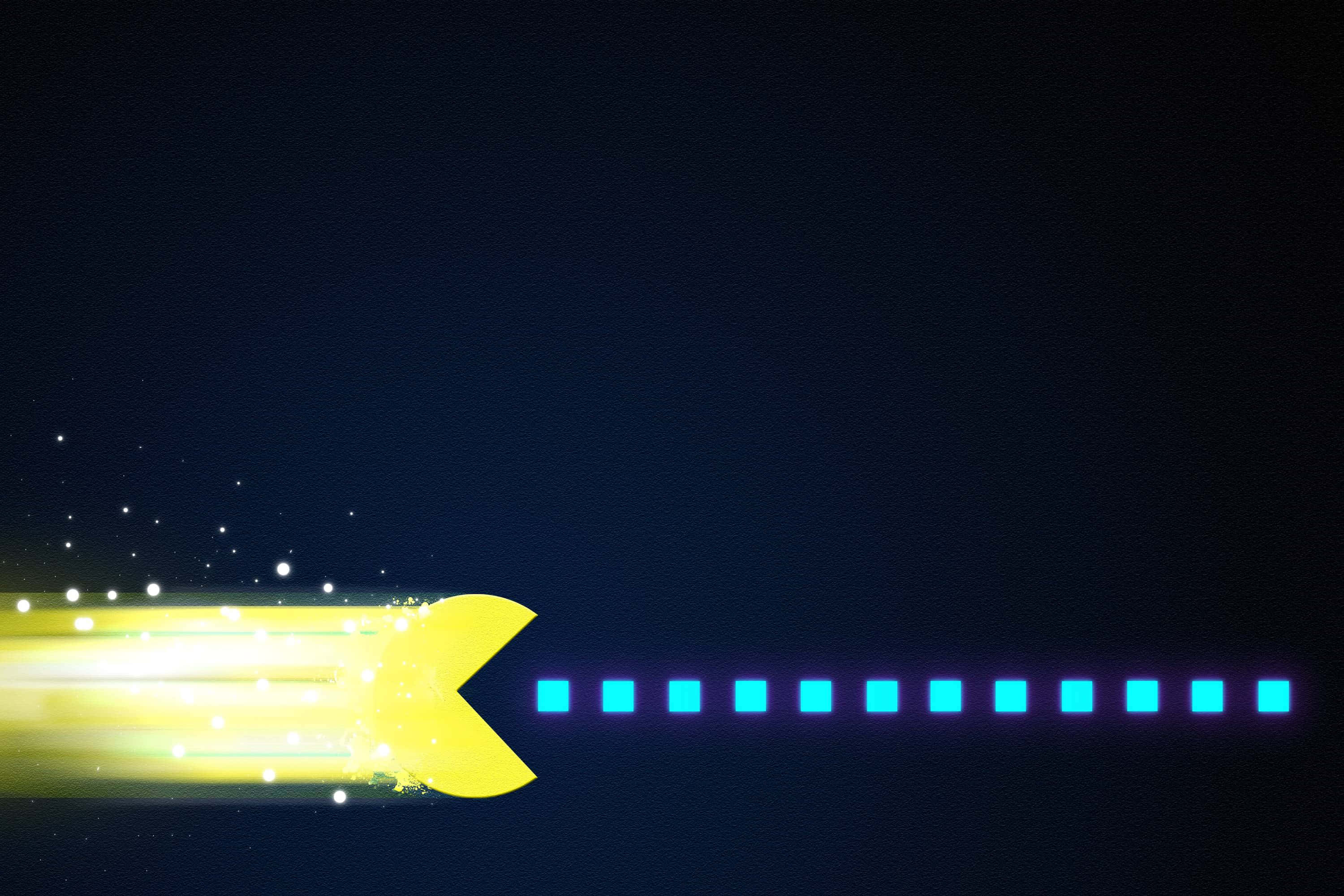 pac man 桌布 壁紙 — 一個發光的黃色 Pac-Man 角色向左衝過深藍色的虛空，留下一串亮藍色的點和閃爍的粒子。
