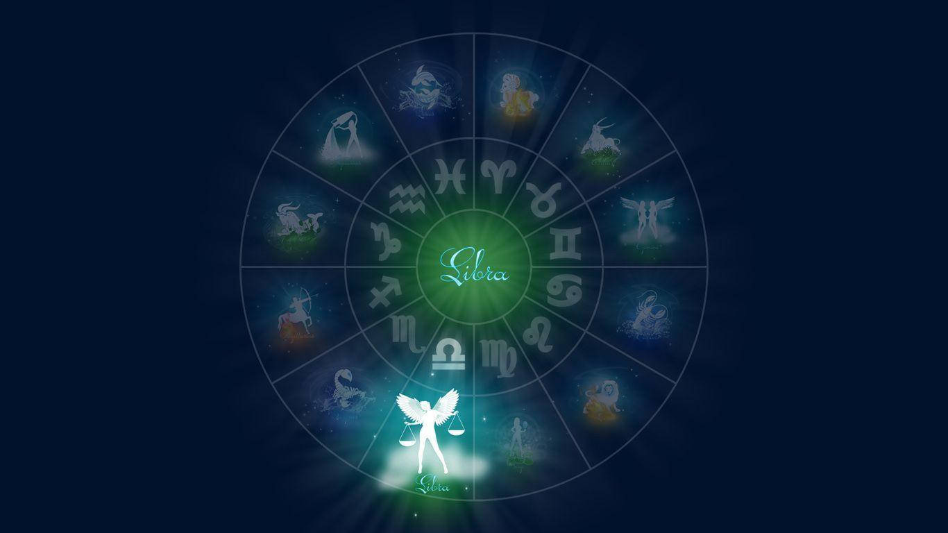 zodiac 桌布 壁紙 — 一個發光的黃道輪，天秤座位於中心，在黑暗的宇宙背景下散發光芒。