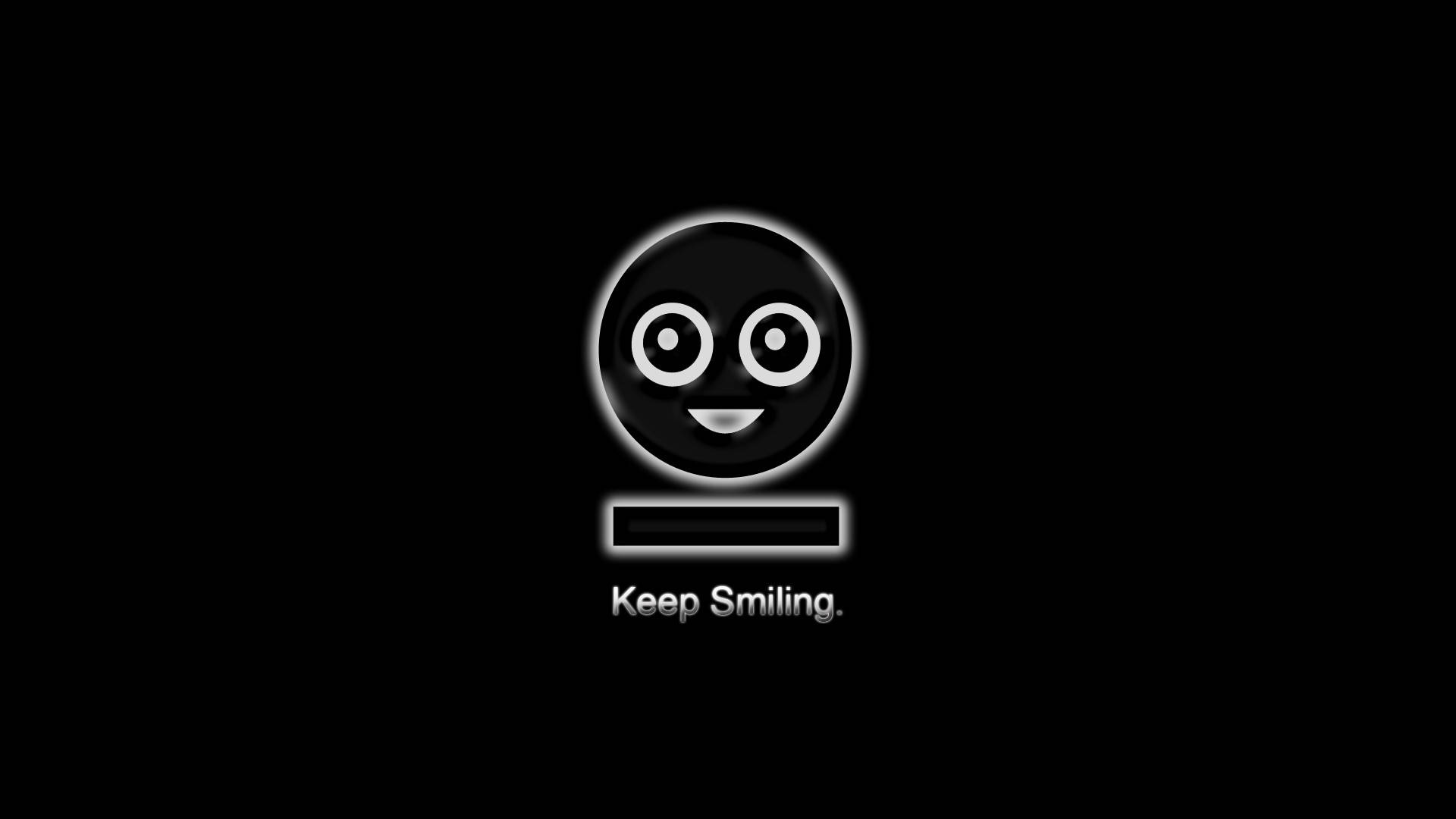 Smile 桌布 壁紙 — 一個發光的黑色笑臉，有白色眼睛和嘴巴，居中在黑色背景上，下方有文字 Keep Smiling。