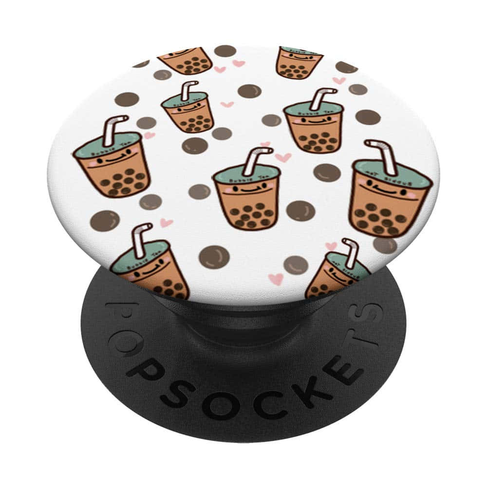 Boba 桌布 壁紙 — 一個白色PopSocket，上面有可愛的卡通珍珠奶茶杯在棕色圓點和粉紅色愛心之間微笑和漂浮。