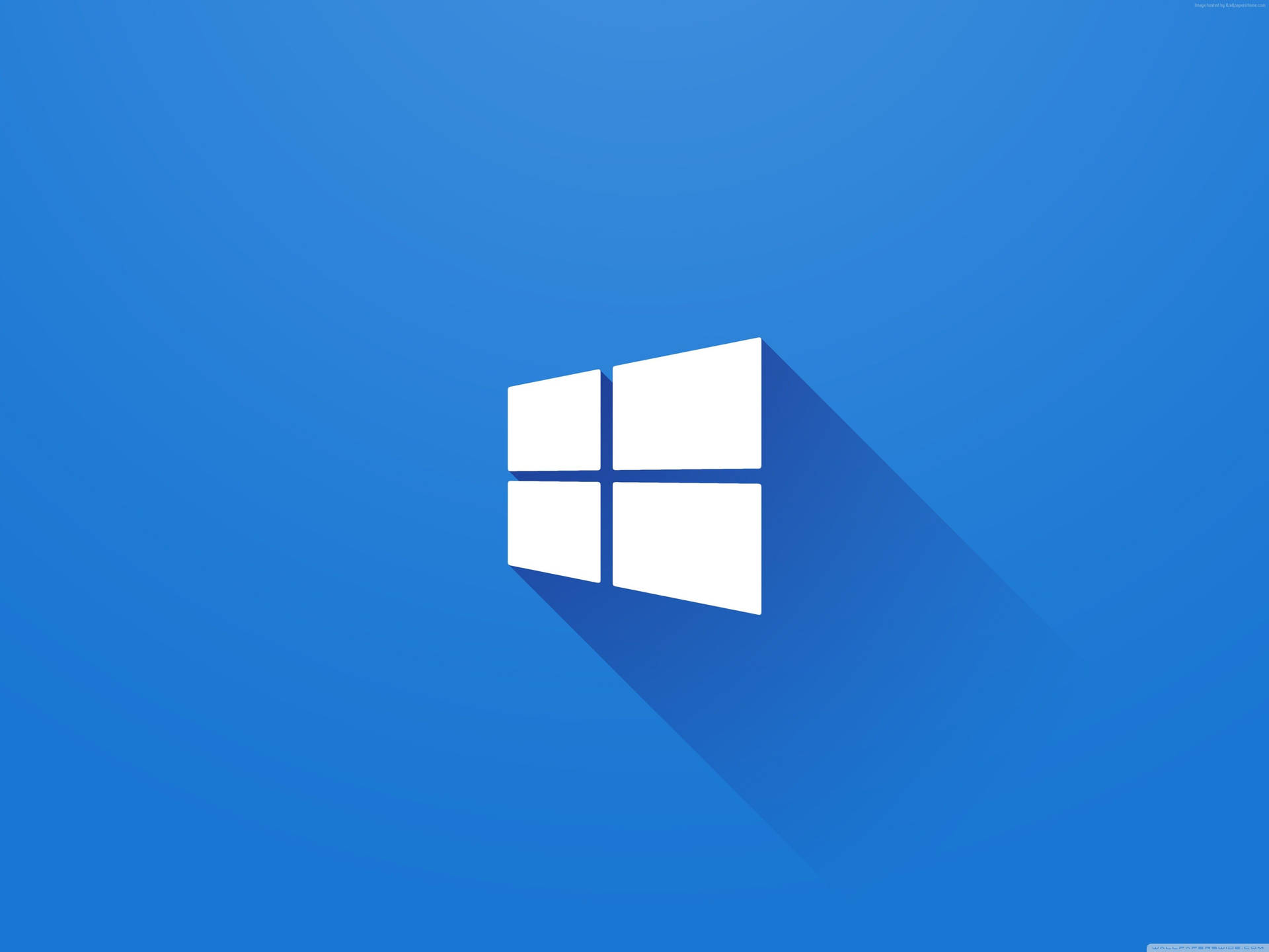 Windows標誌帶長陰影在藍色漸變背景上 — Microsoft 壁紙
