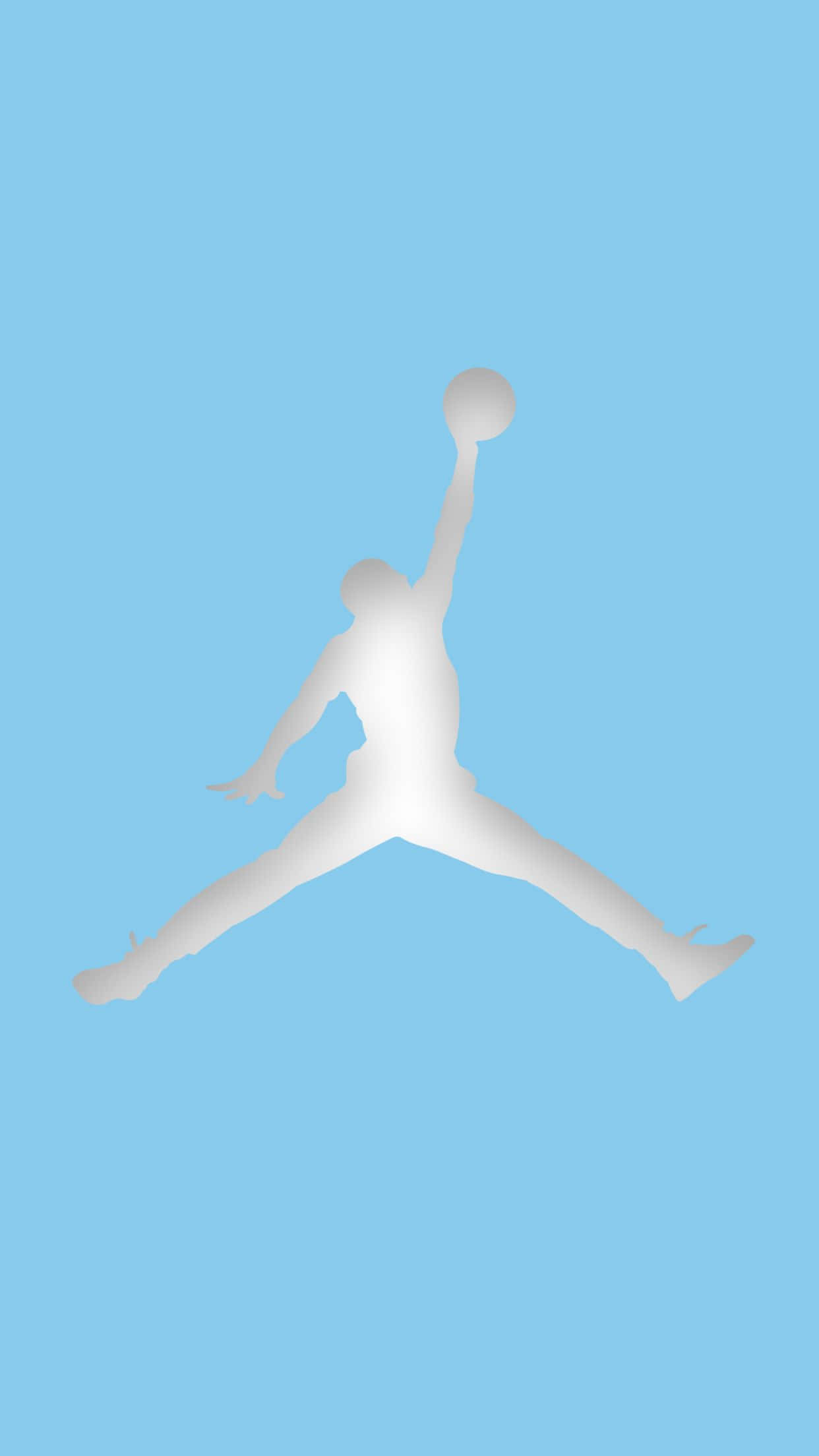 Air Jordan 桌布 壁紙 — 一個白色剪影，描繪籃球運動員在半空中灌籃，背景為純淺藍色。