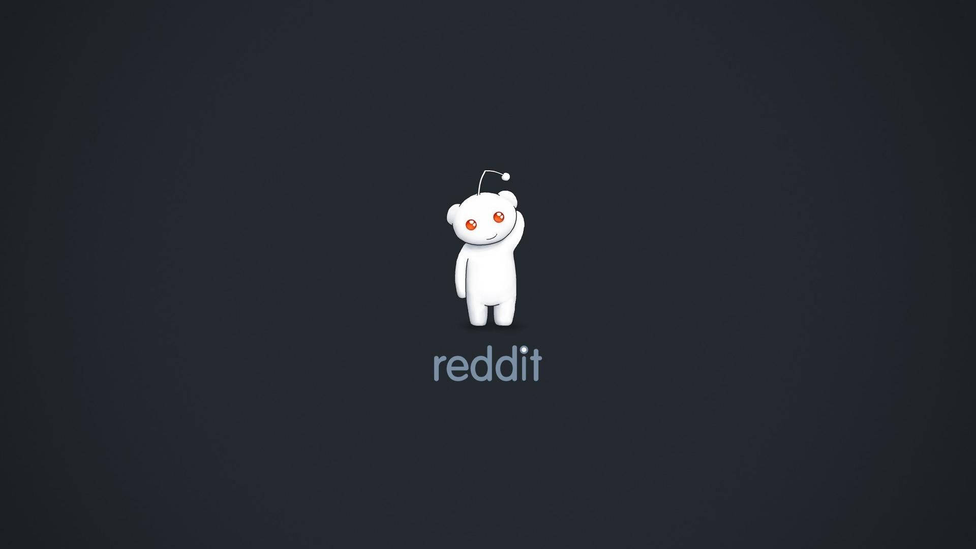 reddit 桌布 壁紙 — 一個白色卡通外星人，有橙色眼睛和天線，站在深灰色背景中央，下方有reddit字樣。