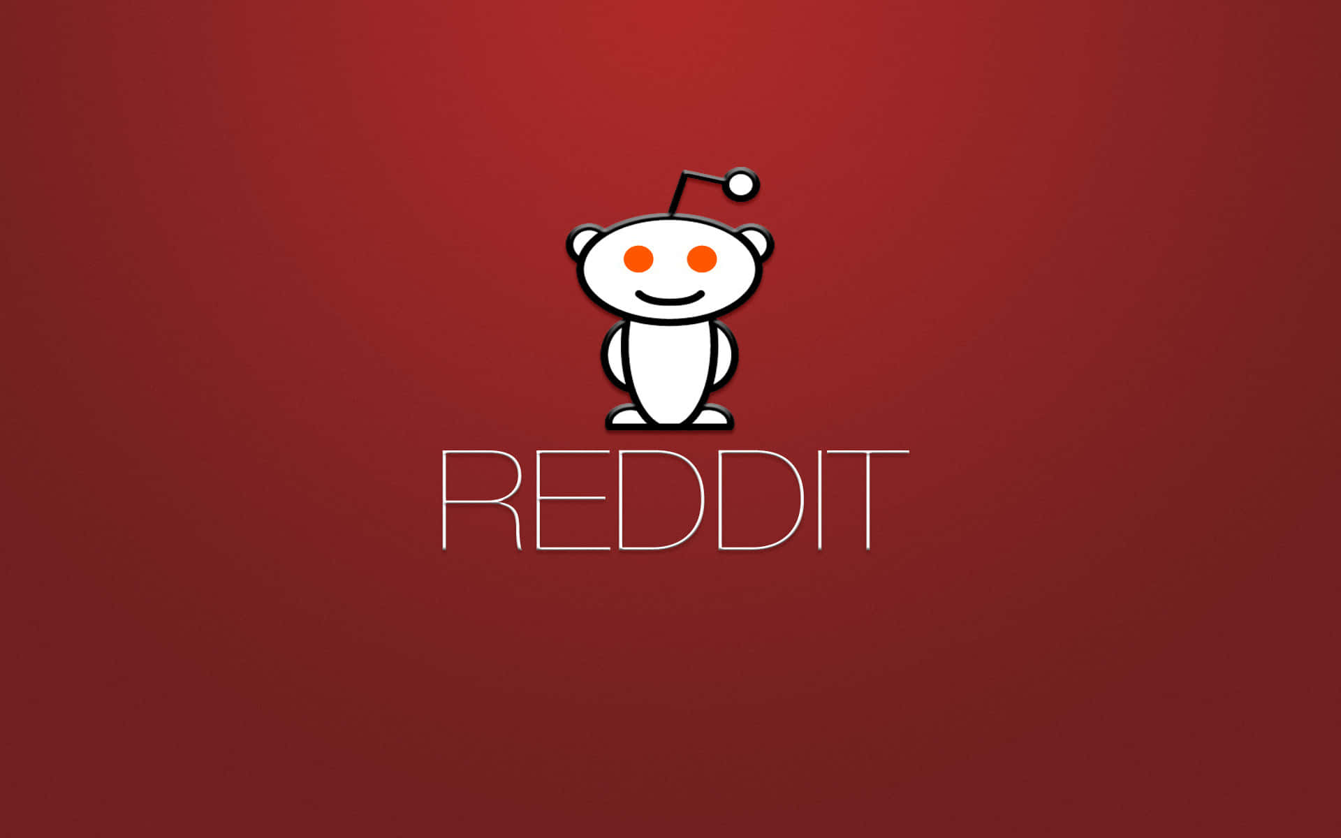 Reddit 桌布 壁紙 — 一個白色卡通外星人吉祥物，有橙色眼睛和天線，居中站立在漸變紅色背景上，下方有 'REDDIT' 字樣。