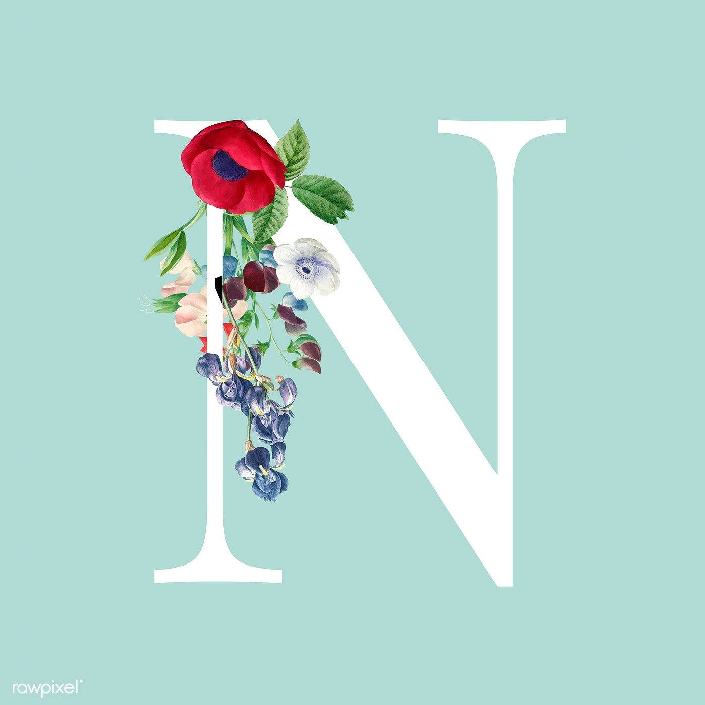 Letter N 桌布 壁紙 — 一個白色大字母N，飾有紅色罌粟花、藍色花朵和綠色葉子，背景為薄荷綠色。