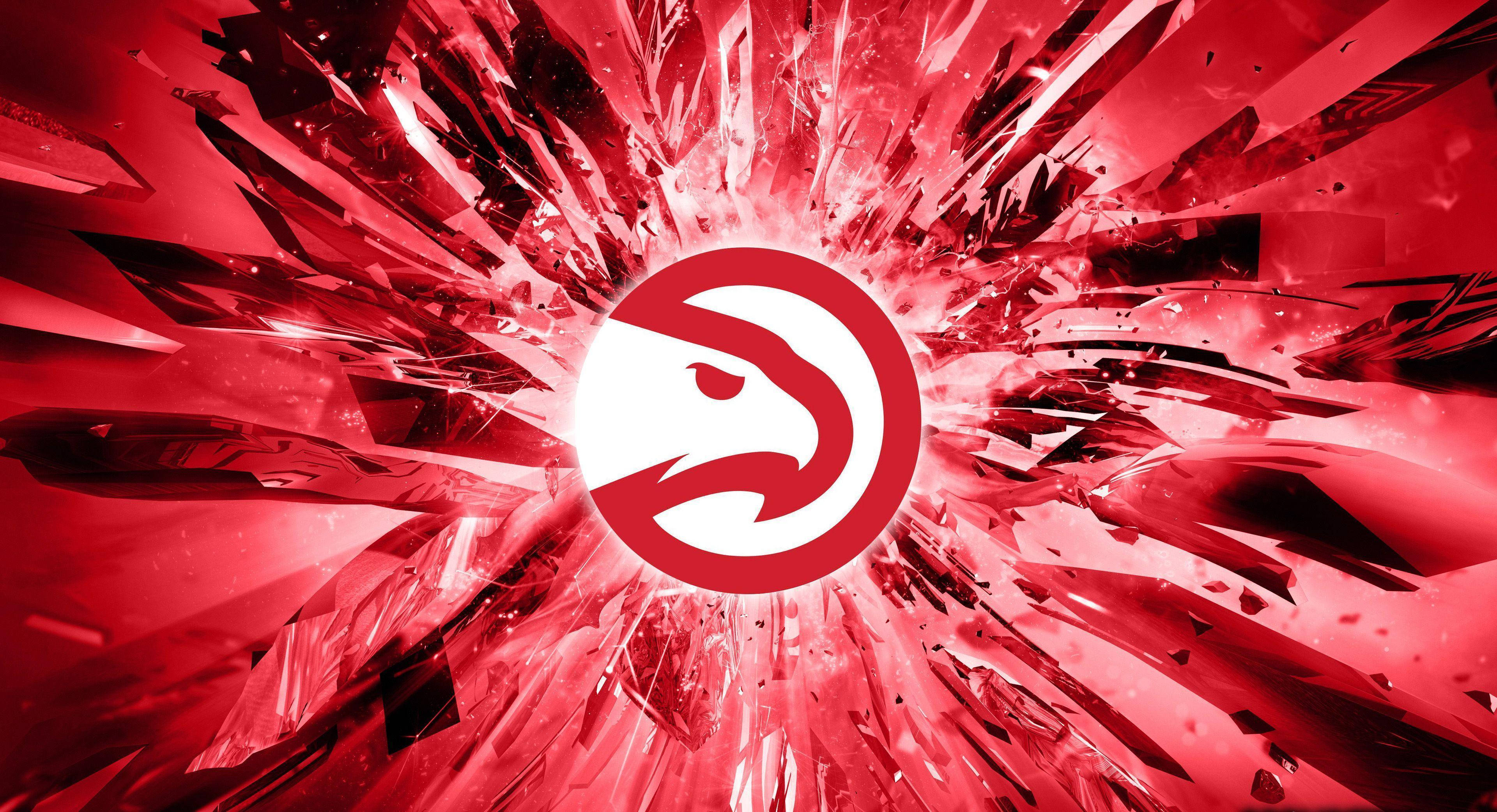 Hawks 桌布 壁紙 — 一個白色獵鷹標誌在動態爆炸中衝破紅色碎裂玻璃碎片。