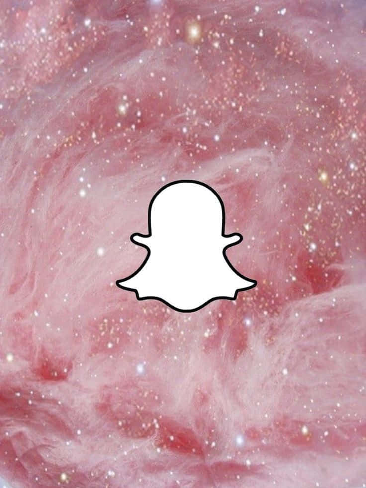snap 桌布 壁紙 — 一個白色的Snapchat鬼魂標誌漂浮在夢幻般的粉紅色宇宙星雲上，點綴著閃爍的星星。