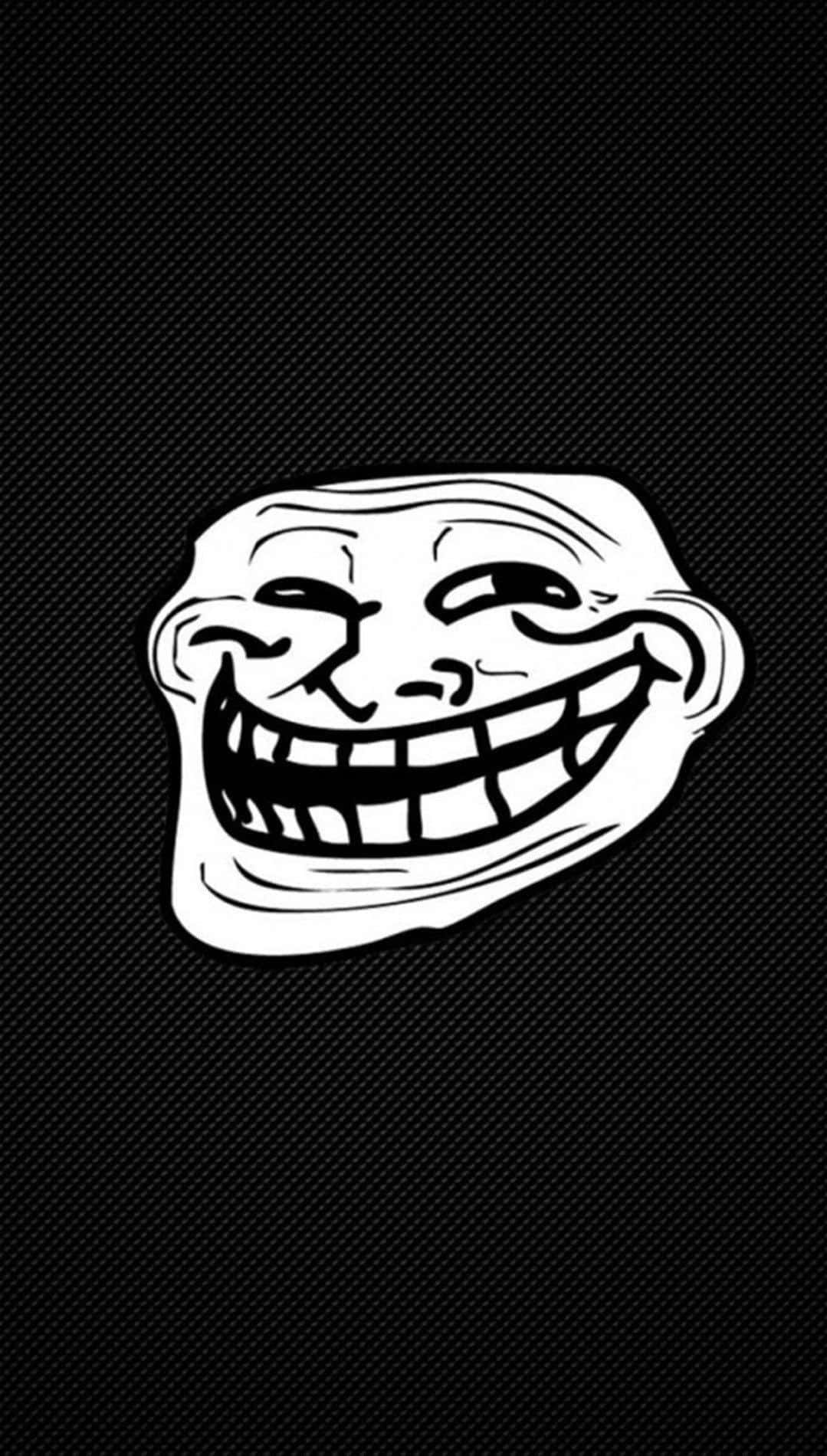 鎖屏 桌布 壁紙 — 一個白色的Troll Face迷因，有寬闊的笑容和瞇起的眼睛，在黑色碳纖維紋理背景上。