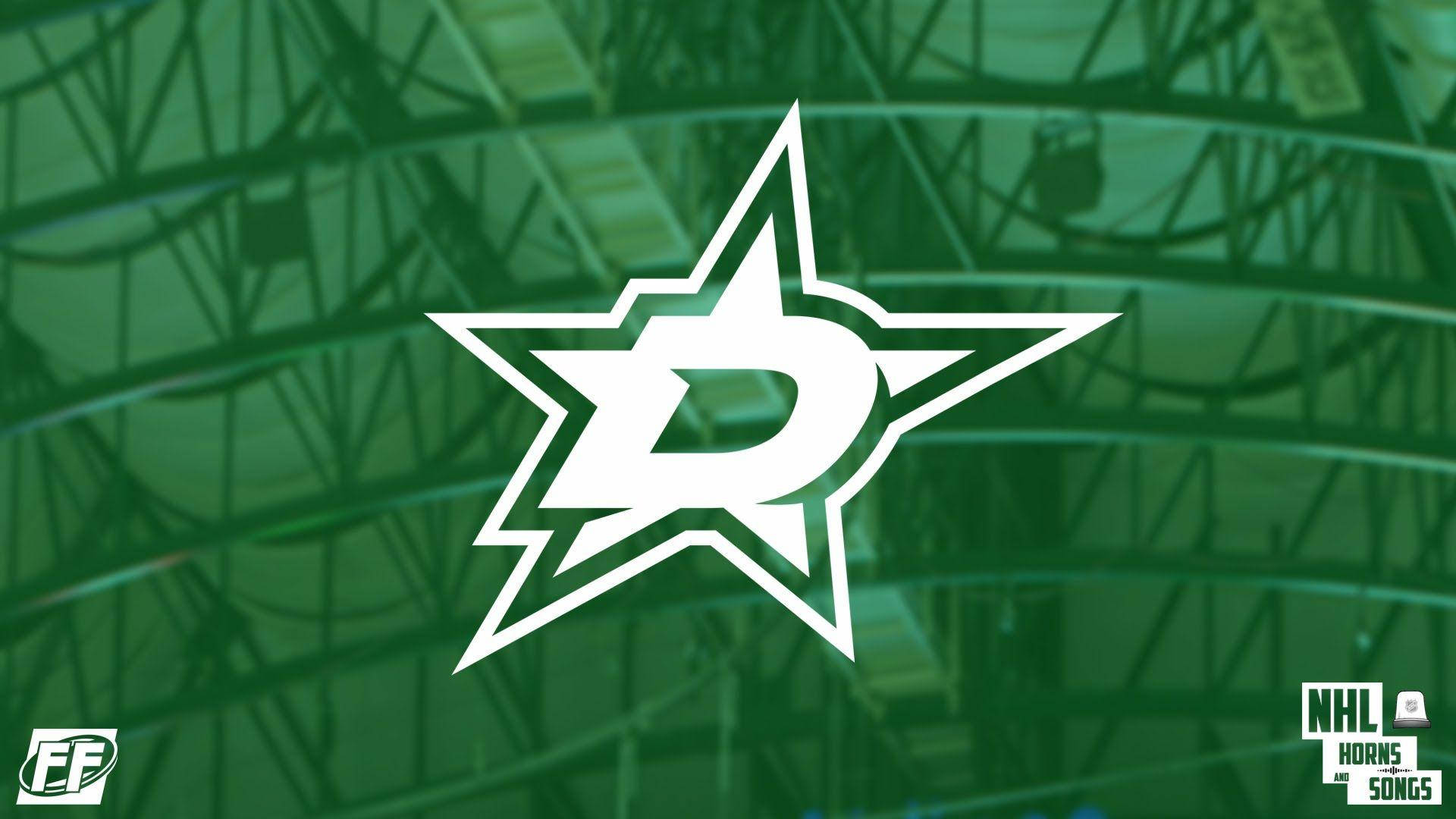 Dallas Stars 桌布 壁紙 — 一個白色的達拉斯星隊標誌在帶有綠色色調的冰球場天花板上突出顯示，可見桁架和照明設備。