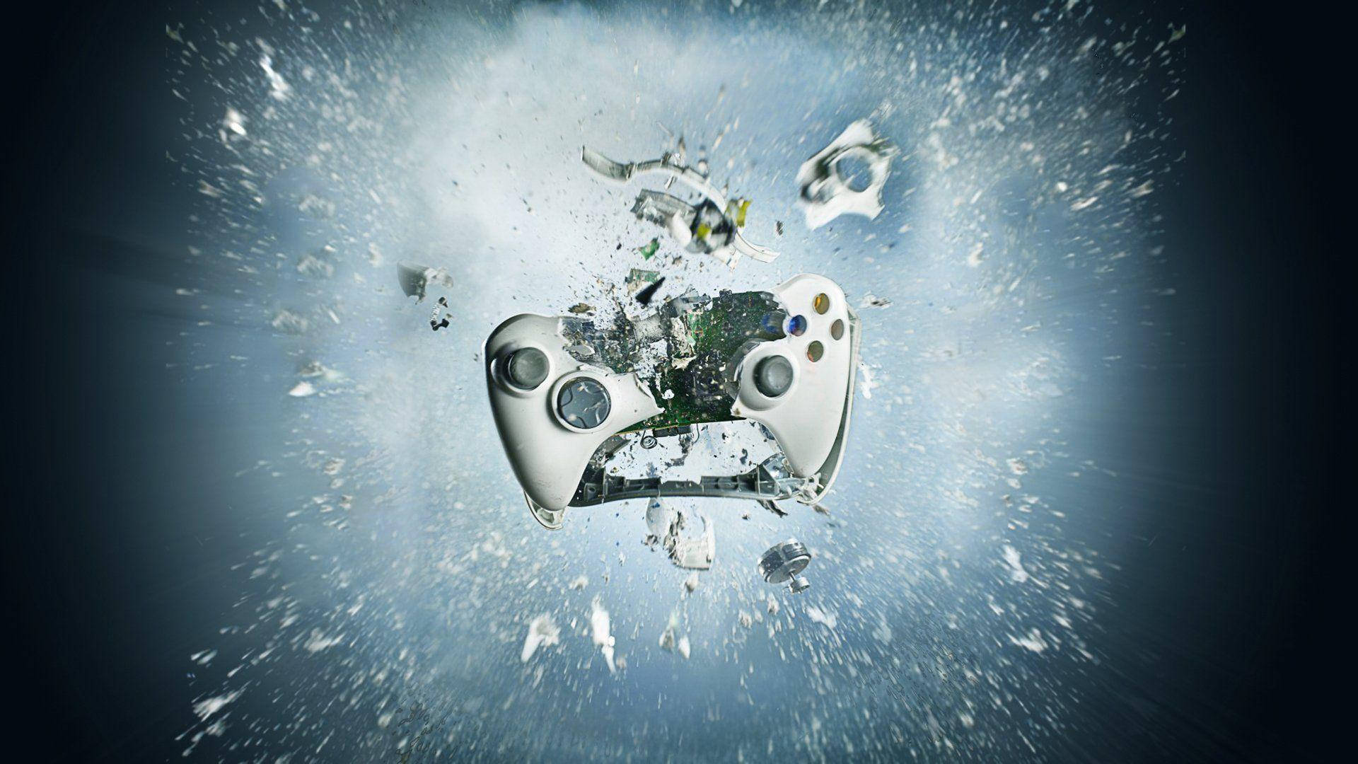 Xbox 桌布 壁紙 — 一個白色遊戲控制器在深藍色背景上向外爆炸，碎裂成無數碎片。
