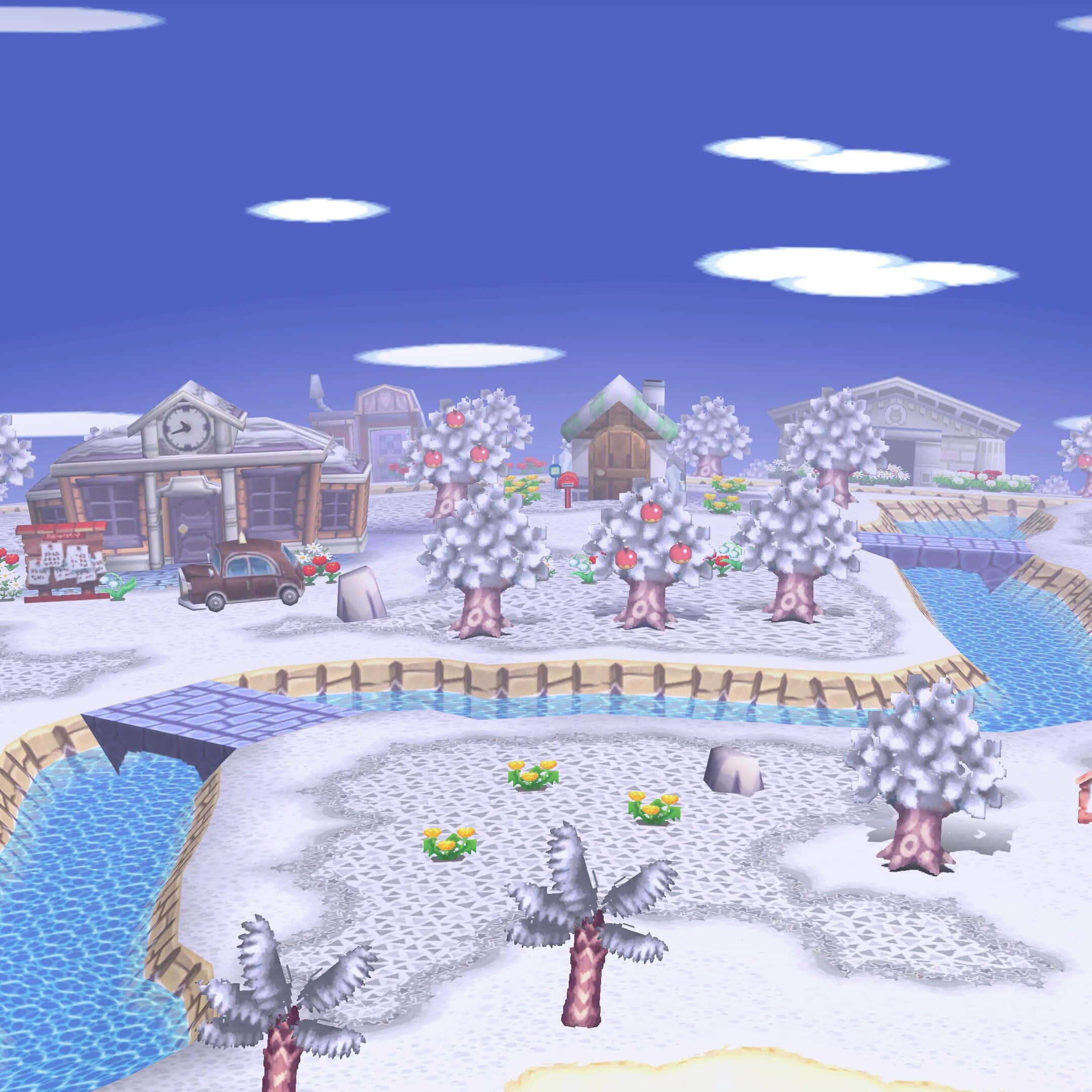 冬天 桌布 壁紙 — 一個白雪覆蓋的村莊場景，有被雪覆蓋的樹木和建築物，在明亮的藍天下有蓬鬆的雲朵。