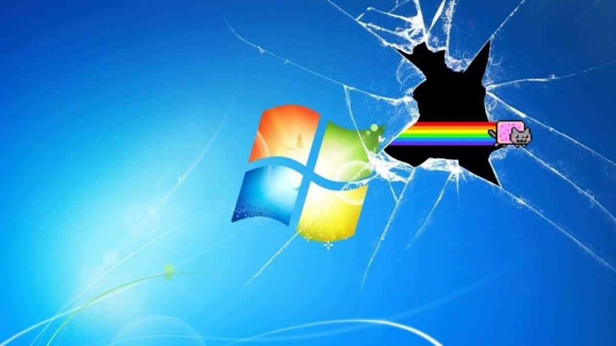 meme 桌布 壁紙 — 一個破裂的藍色Windows桌布，Nyan Cat從破碎的玻璃中彈出。