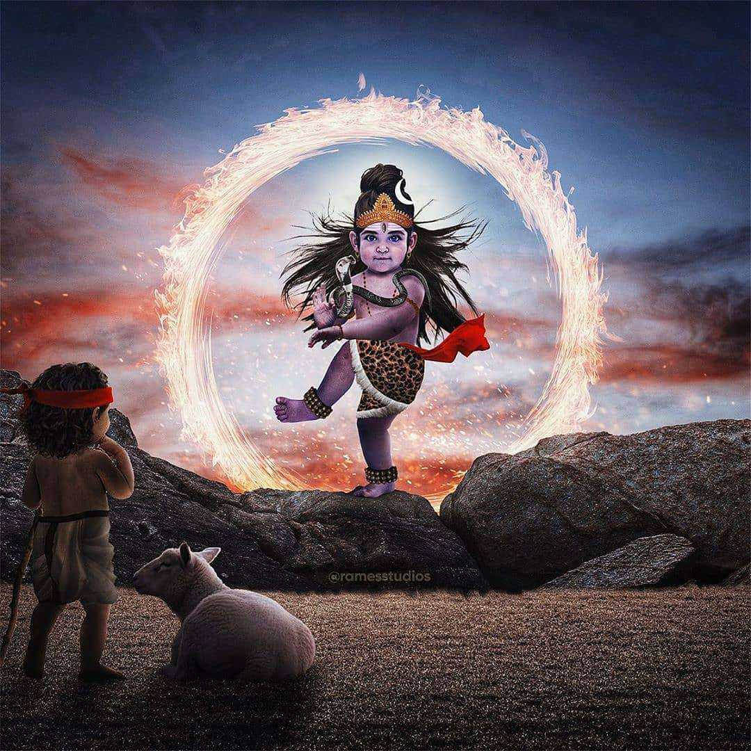 bhole baba 桌布 壁紙 — 一個神聖的孩子神站在岩石上，被熾熱的火環包圍，而一個年輕男孩和羊在下面觀看。