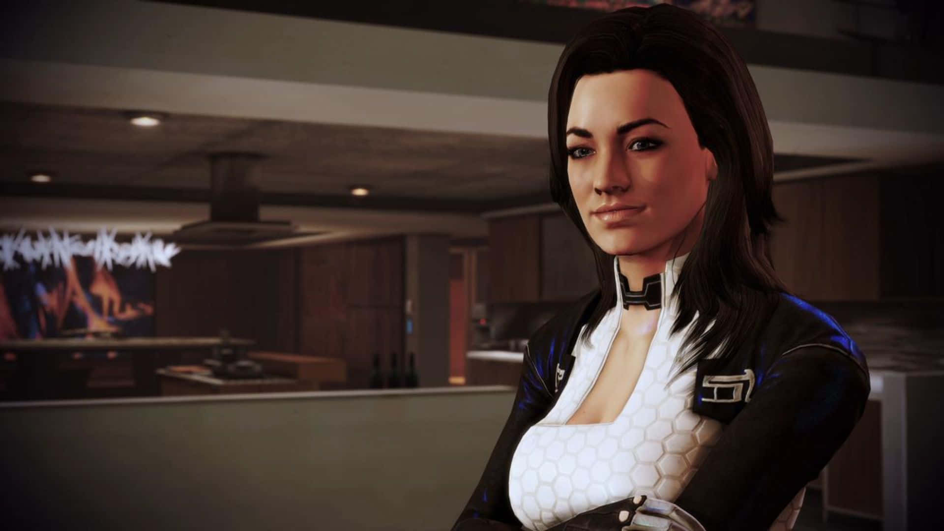 Miranda Lawson 桌布 壁紙 — 一個穿著未來主義黑白服裝的女性角色自信地站在一個有溫暖環境照明的現代廚房裡。