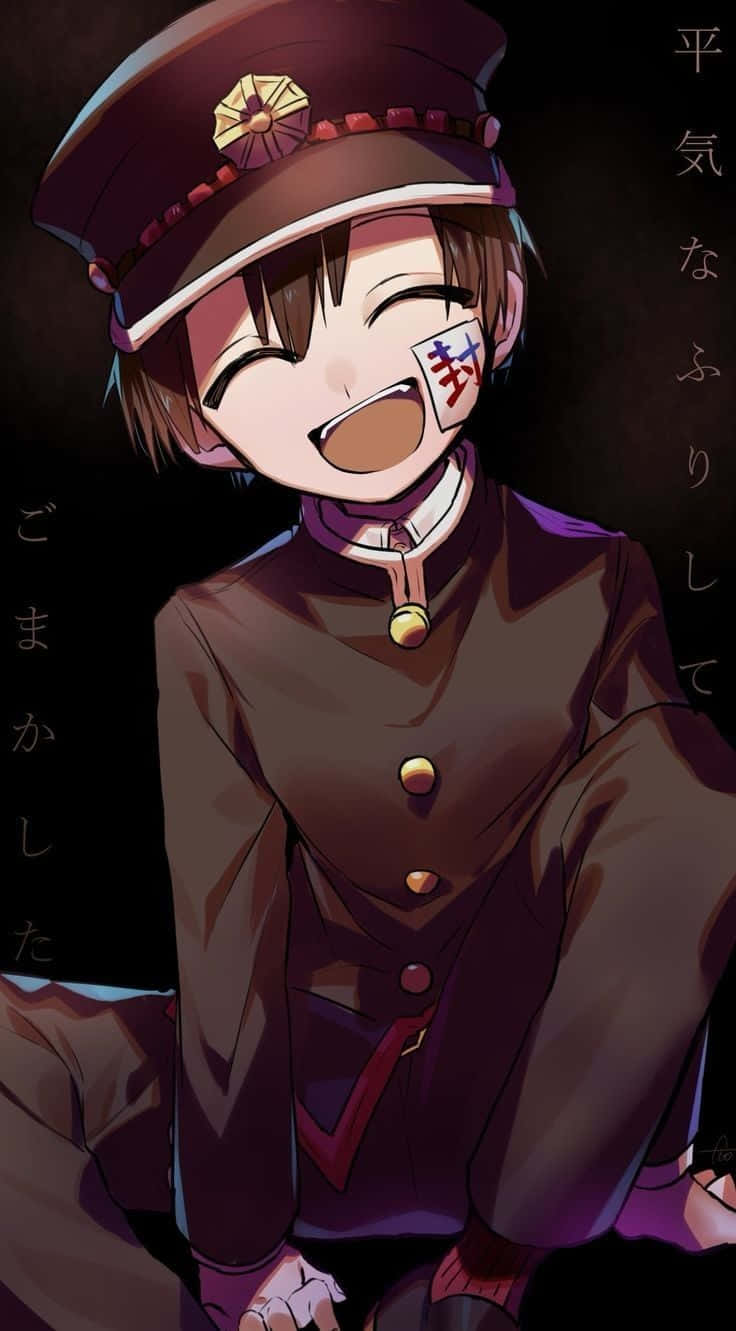 Cute Boy Anime 桌布 壁紙 — 一個穿著棕色制服和帽子的開朗動畫男孩，臉上帶著頑皮的表情，臉頰上有紅色印記，正在大笑。