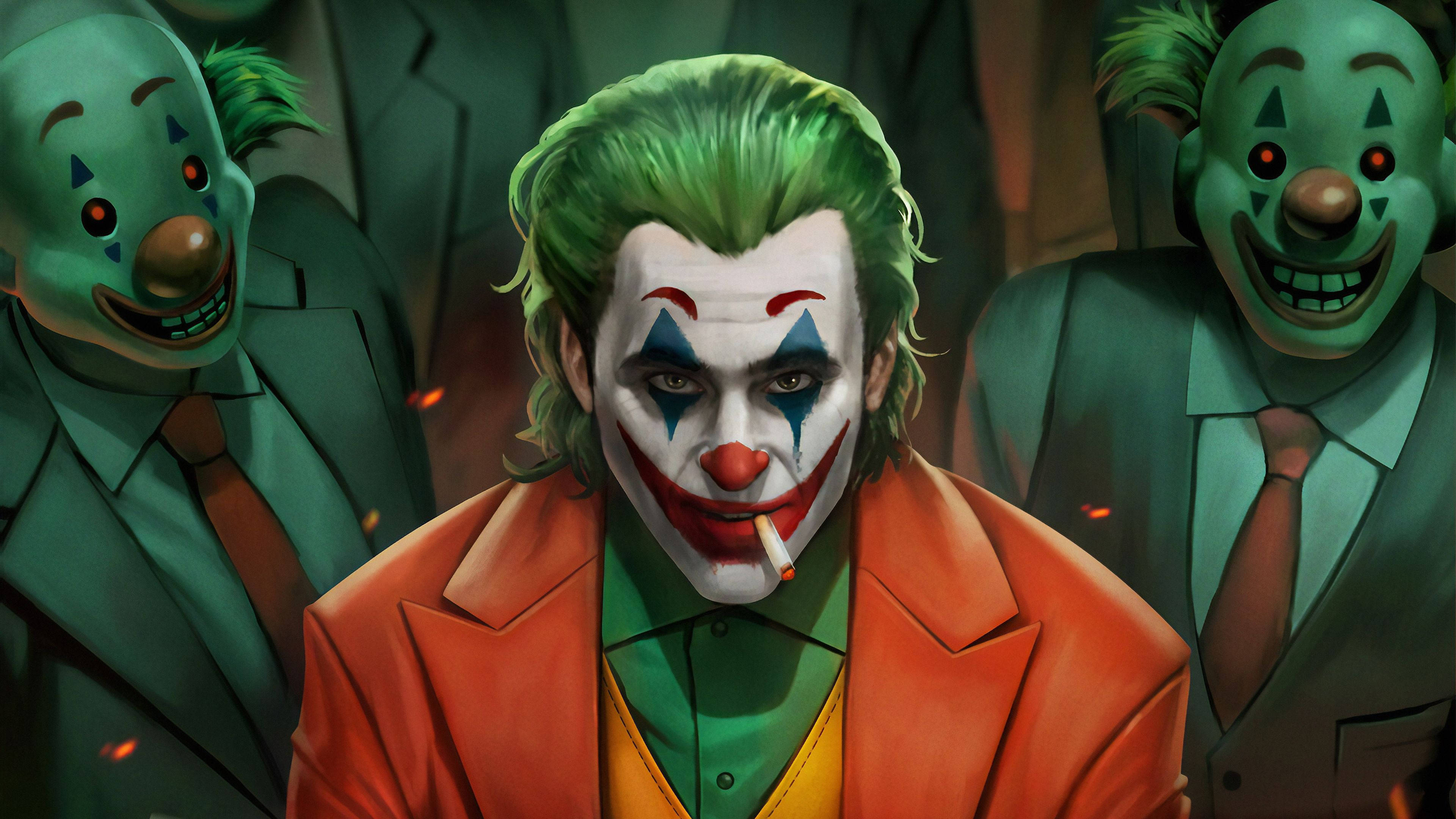 Joker 2019 桌布 壁紙 — 一個穿著橙色西裝的威脅性小丑在昏暗的場景中抽煙，兩旁有兩個綠色小丑手下。