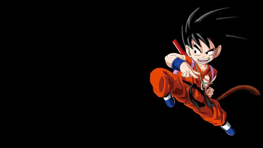 90 Anime Aesthetic 桌布 壁紙 — 一個穿著橙色道服和藍色靴子的年輕動漫男孩，在黑色背景上帶著堅定的笑容動態跳躍。