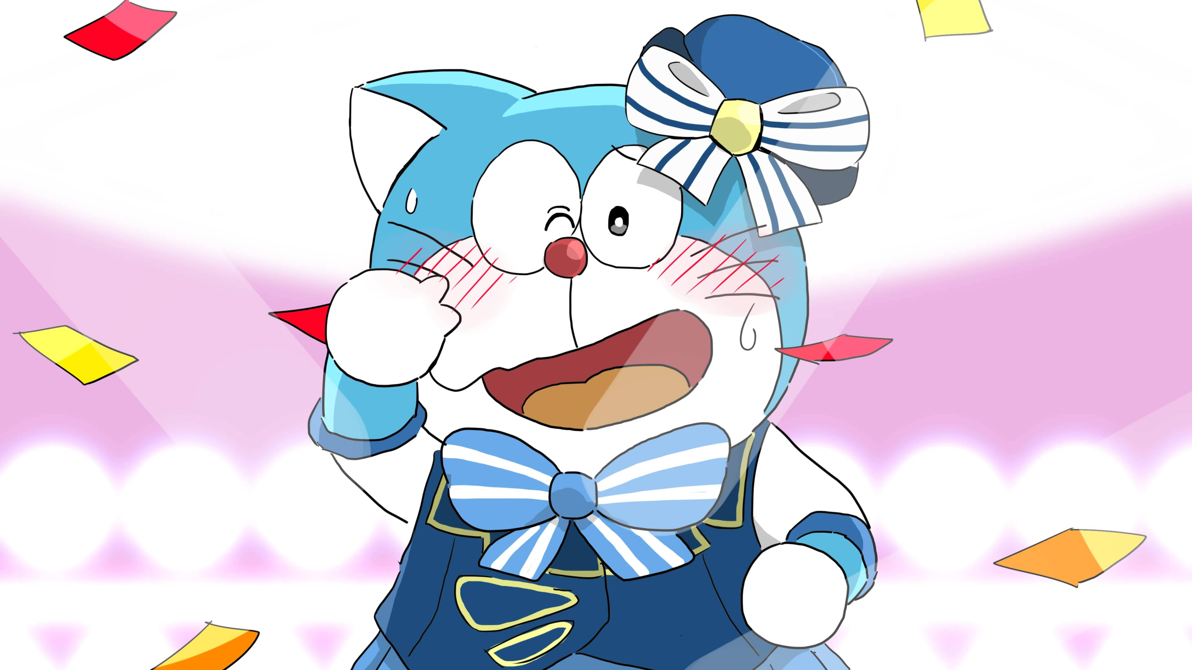 Doraemon 桌布 壁紙 — 一個穿著水手服的開心藍色貓型機器人，周圍有五彩紙屑飛舞，露出燦爛的笑容。
