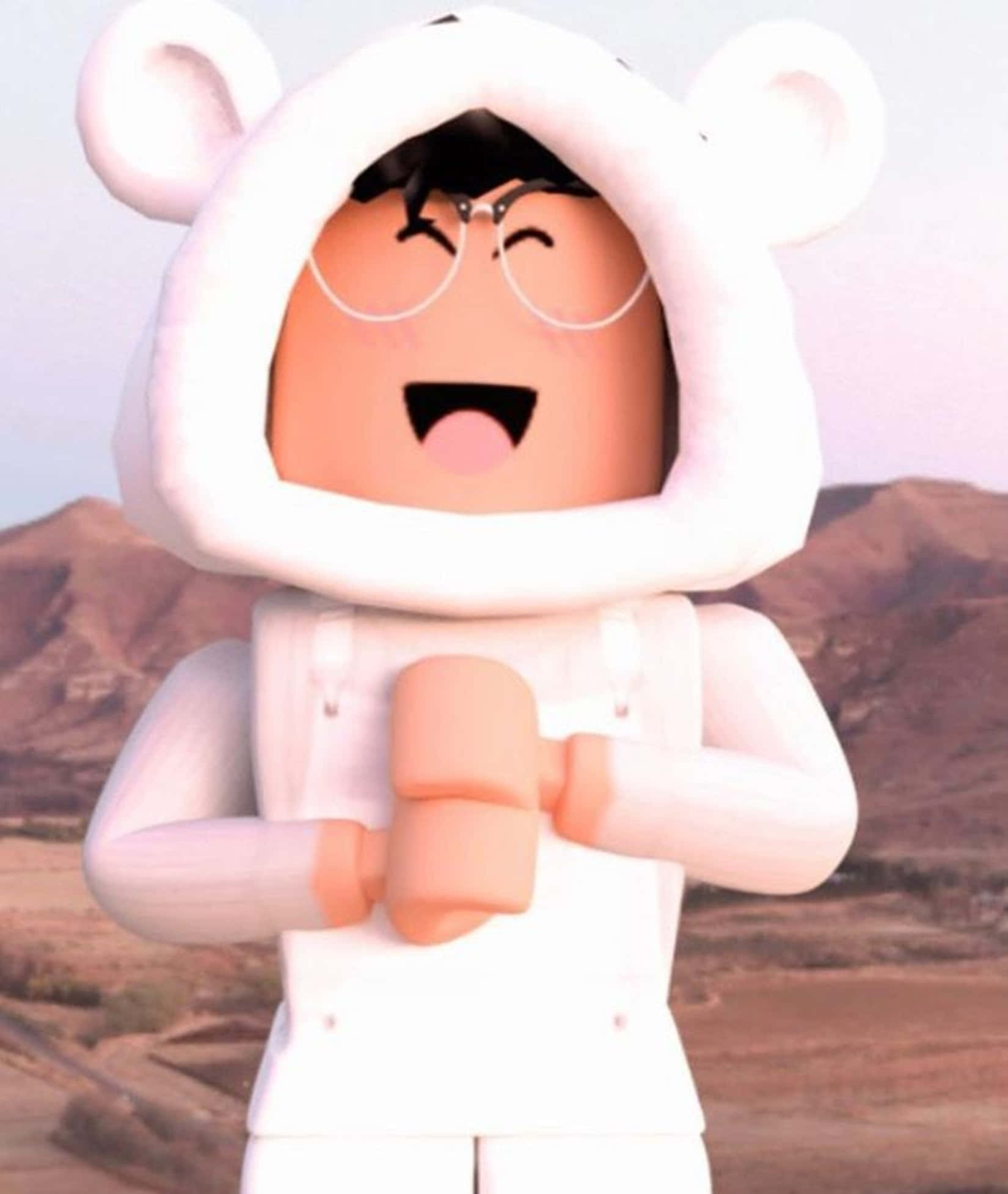 Roblox Gfx 桌布 壁紙 — 一個穿著白色熊帽衫的愉快Roblox角色在沙漠山脈背景下歡樂地大笑。