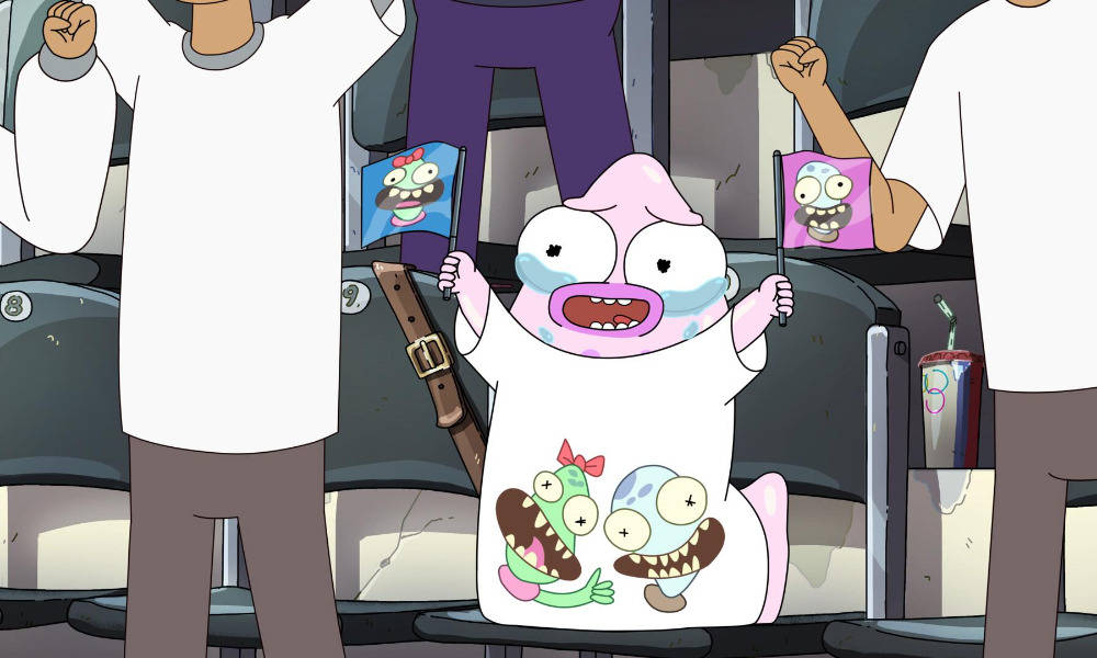 Animated 桌布 壁紙 — 一個穿著白襯衫的卡通人物在體育館座位上瘋狂歡呼，手持兩面有怪物面孔的小旗。