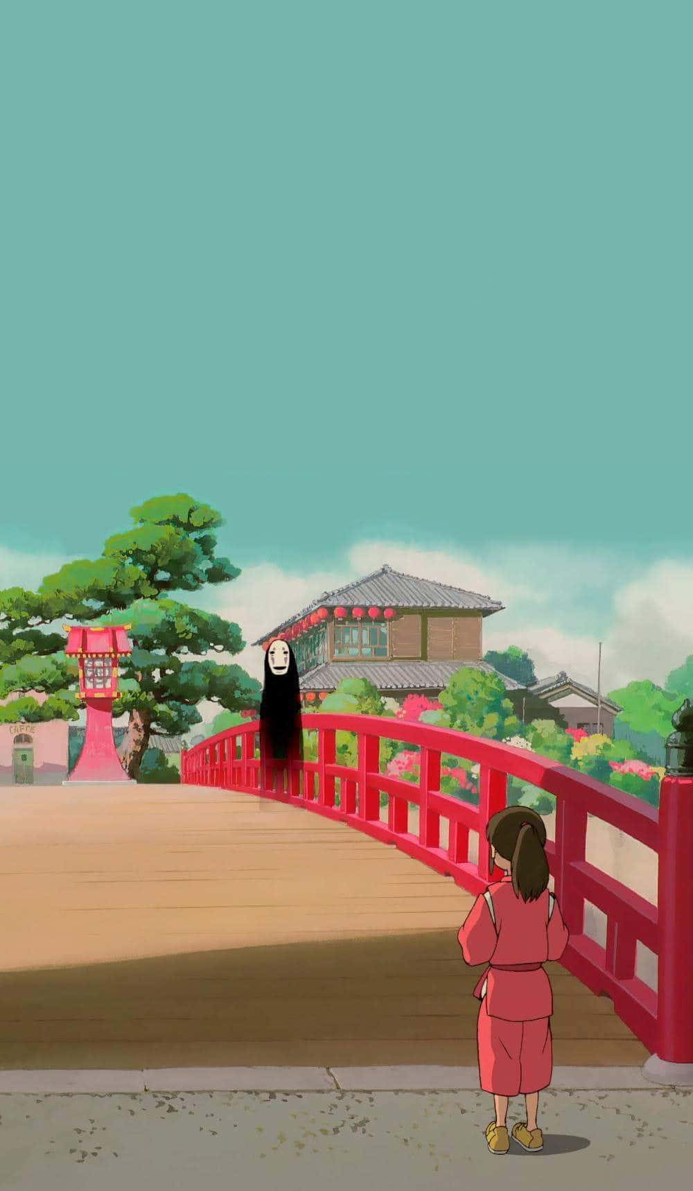 吉卜力 桌布 壁紙 — 一個穿著粉紅色衣服的小女孩站在紅色橋上，面對著《神隱少女》中的無臉男，天空是藍綠色。