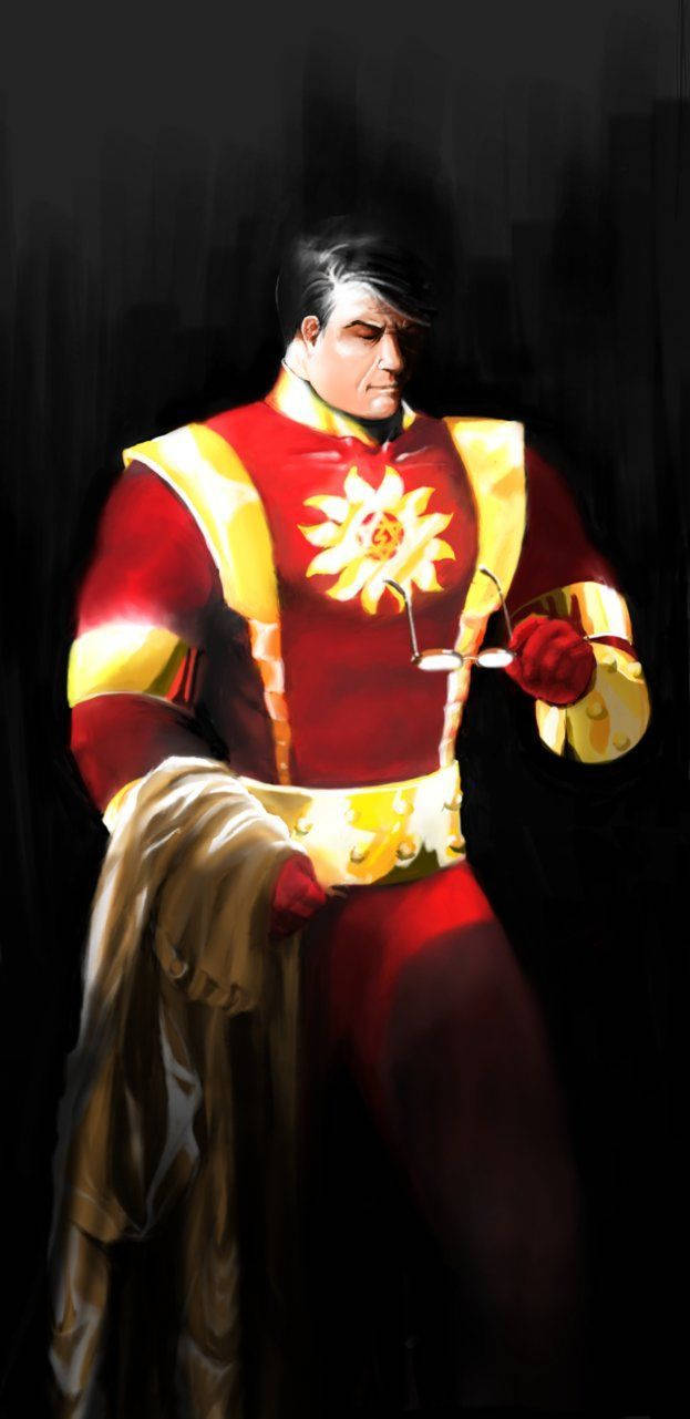 Shaktiman 桌布 壁紙 — 一個穿著紅色和金色套裝、帶有太陽標誌的超級英雄站在陰影中，拿著斗篷和眼鏡。