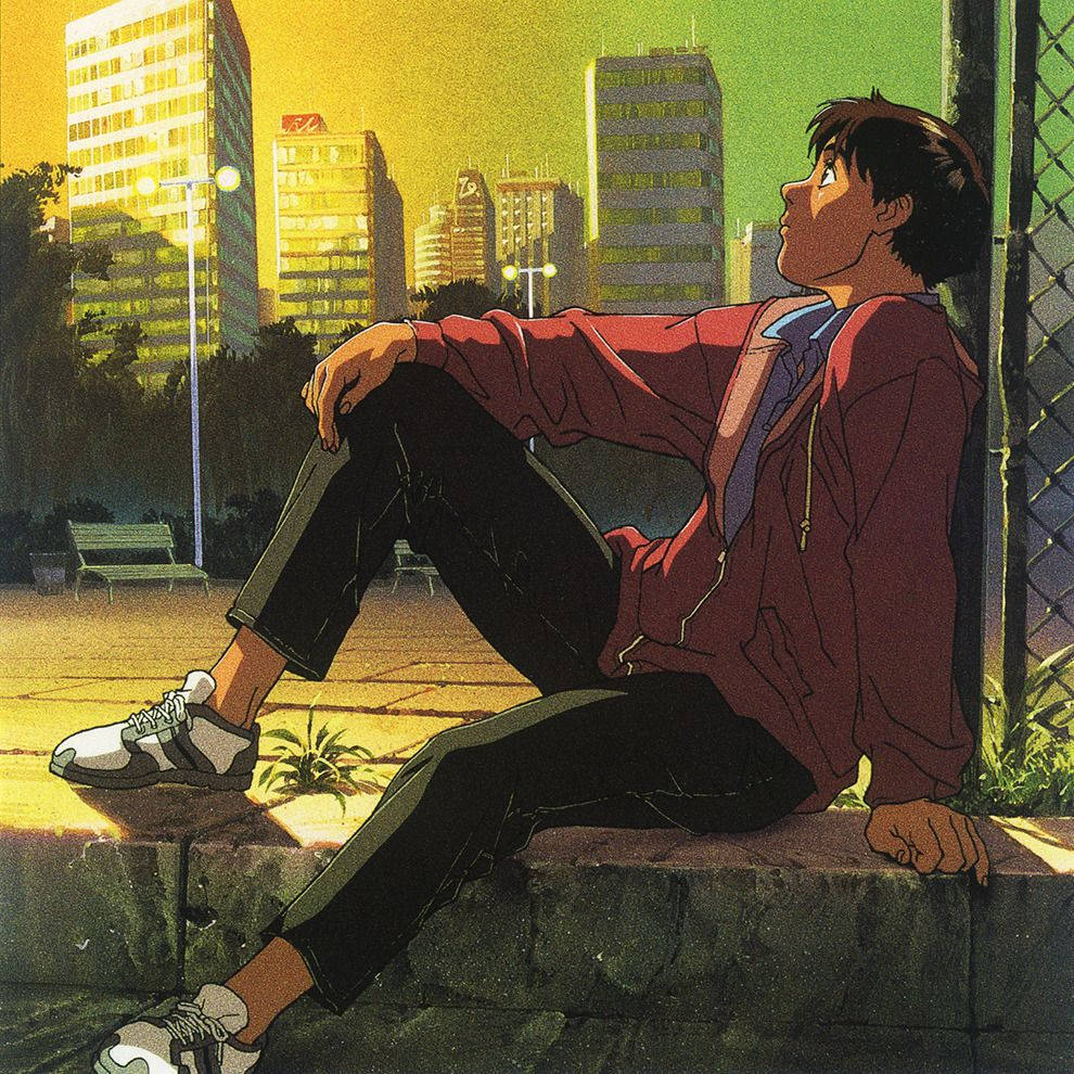 動漫男孩 桌布 壁紙 — 一個穿著紅色外套的年輕男子坐在陽光普照的城市公園的石緣上，仰望沐浴在金色晚霞中的高樓大廈。