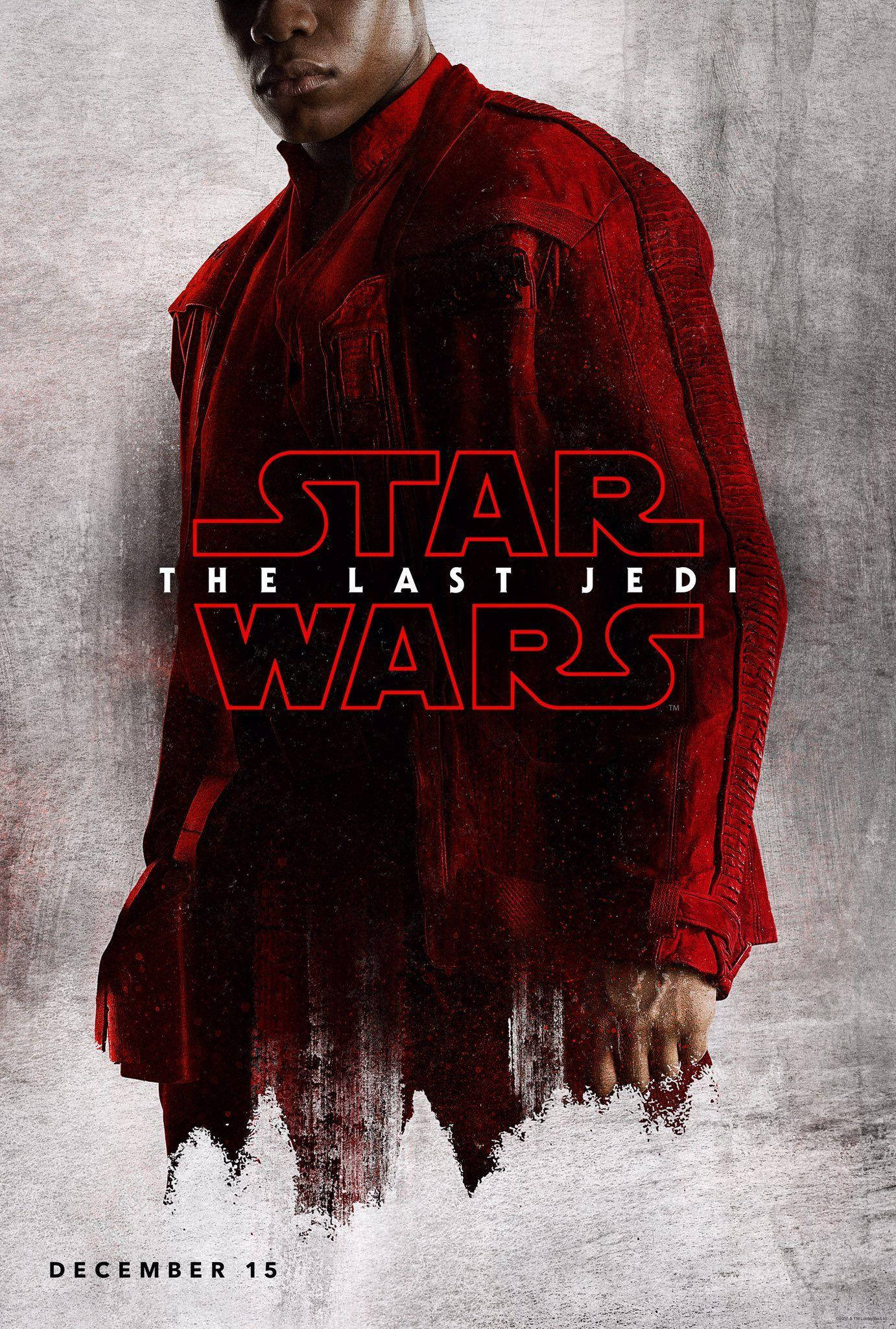 The Last Jedi Star Wars 桌布 壁紙 — 一個穿著紅色外套的角色站在有紋理的灰色牆壁前，上面覆蓋著《星際大戰：最後的絕地武士》的標題。
