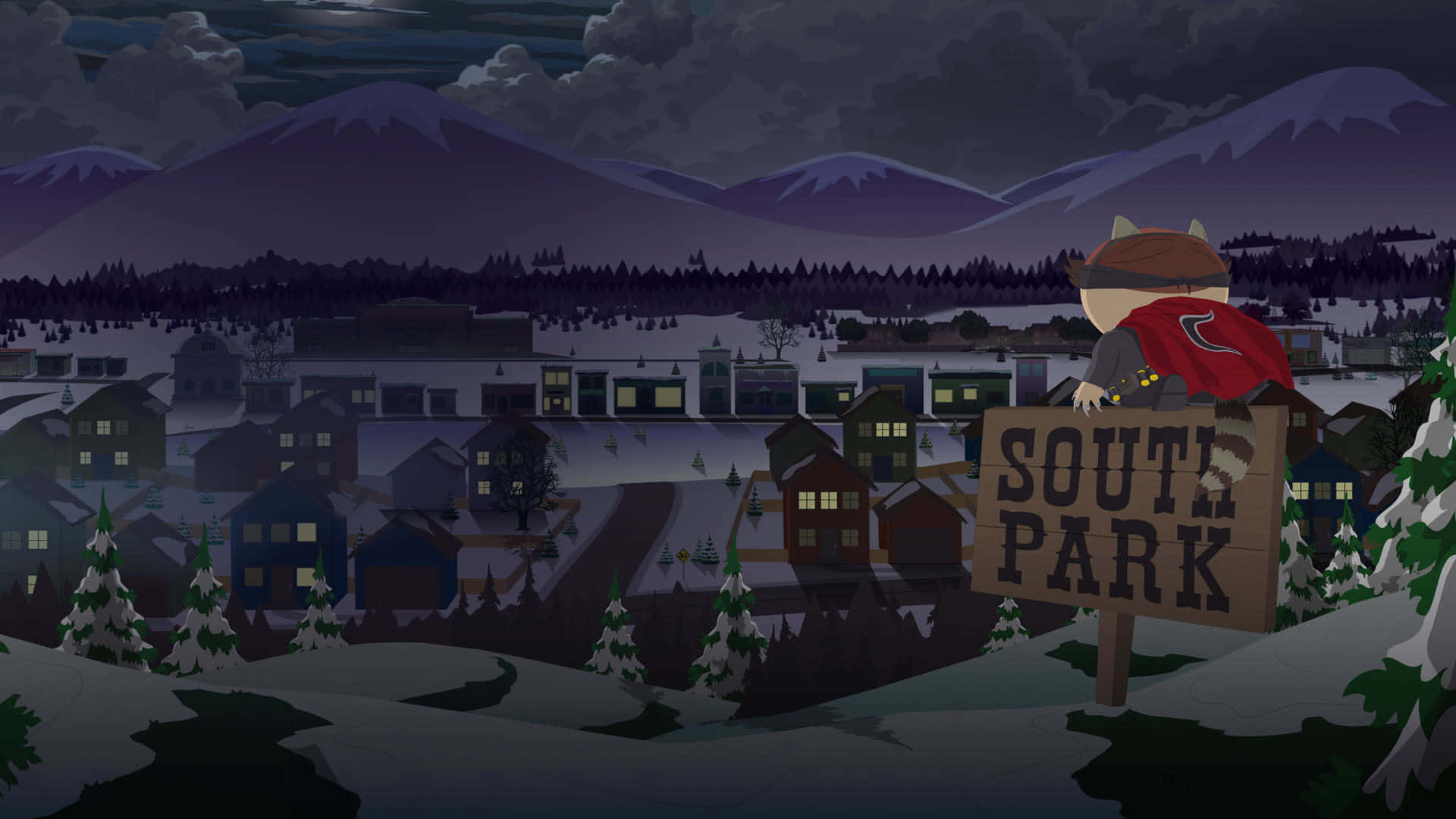 南方公園 桌布 壁紙 — 一個穿著紅色斗篷的卡通人物站在「SOUTH PARK」標誌上，俯瞰夜晚被雪覆蓋的小鎮，窗戶發光，遠處有山脈。